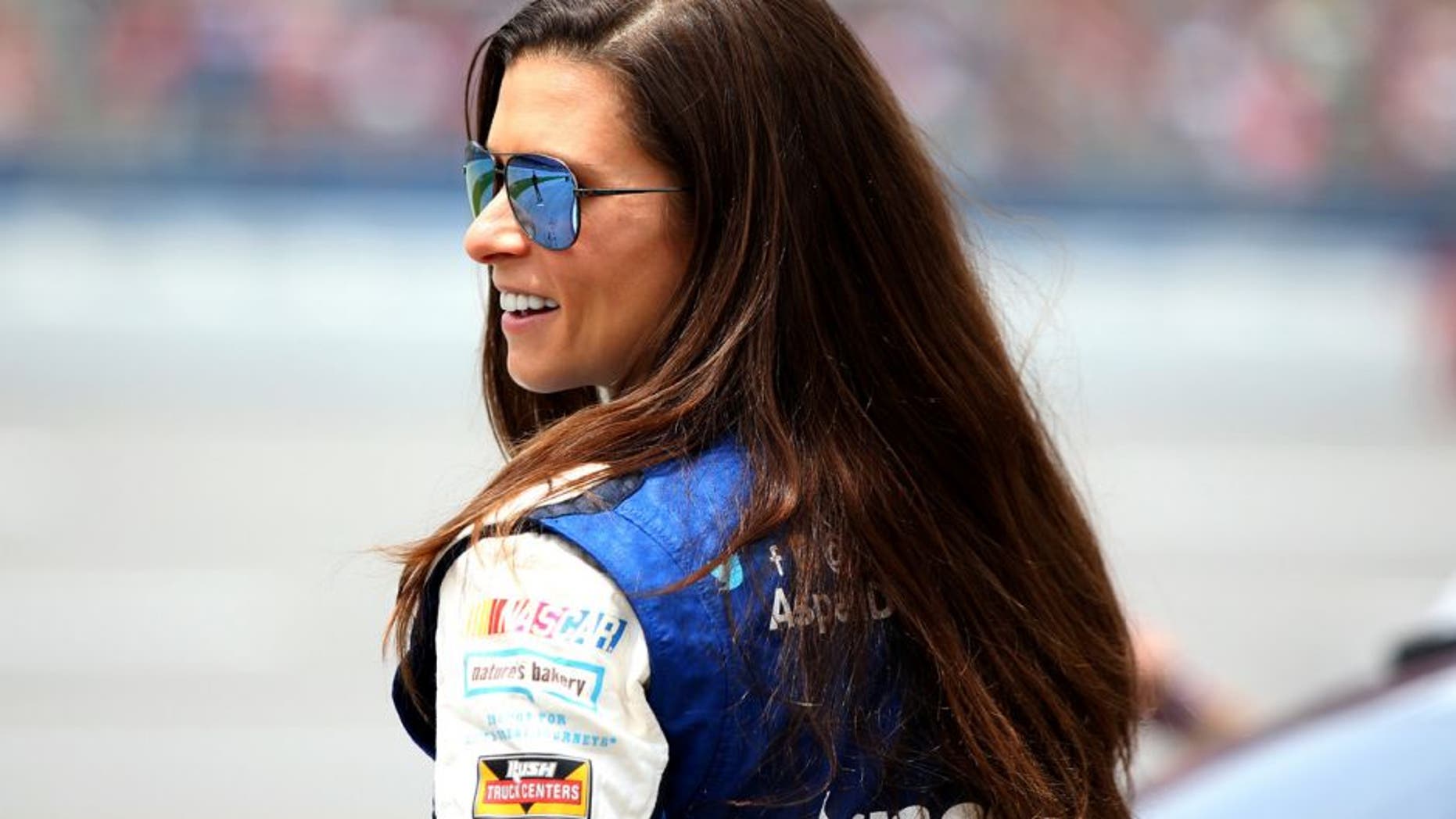 TALLADEGA, AL - APRIL 30: Danica Patrick, driver of the #10 Aspen Dental Chevrolet, stands on the grid during qualifying for the NASCAR Sprint Cup Series GEICO 500 at Talladega Superspeedway on April 30, 2016 in Talladega, Alabama. (Photo by Sean Gardner/Getty Images)