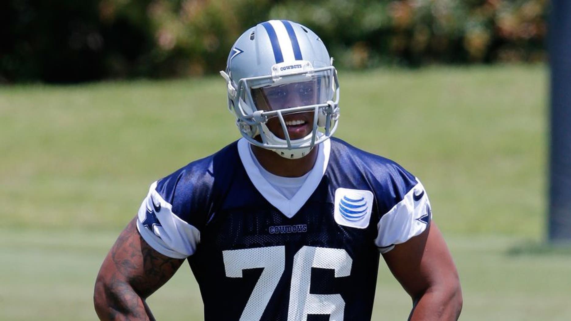 May 27, 2015; Dallas, TX, USA; Dallas Cowboys defensive end Greg Hardy (76) smiles during OTAs at Dallas Cowboys Headquarters. Mandatory Credit: Matthew Emmons-USA TODAY Sports