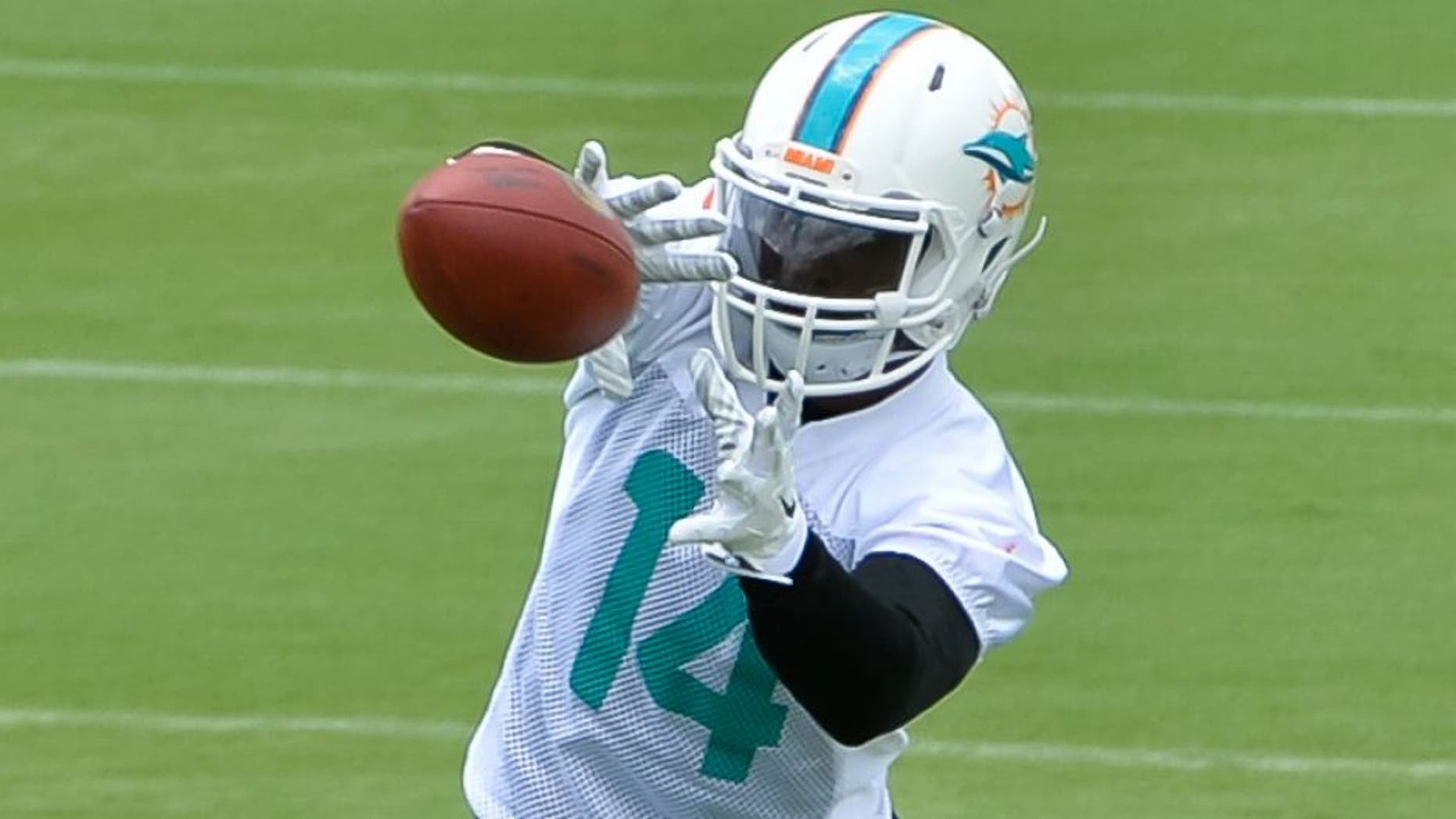 May 26, 2015; Miami, FL, USA; Miami Dolphins wide receiver Jarvis Landry (14) during practice drills at Miami Dolphins Training Facility. Mandatory Credit: Steve Mitchell-USA TODAY Sports