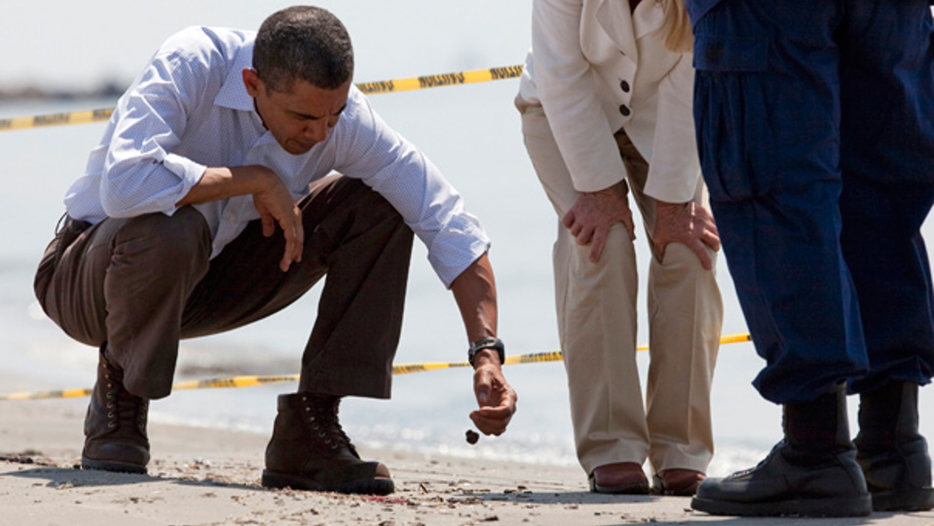 May 28: President Obama picks up a "tar ball" during a tour of areas impacted by the Gulf Coast oil spill in Port Fourchon, La. He returns to the region on Monday.