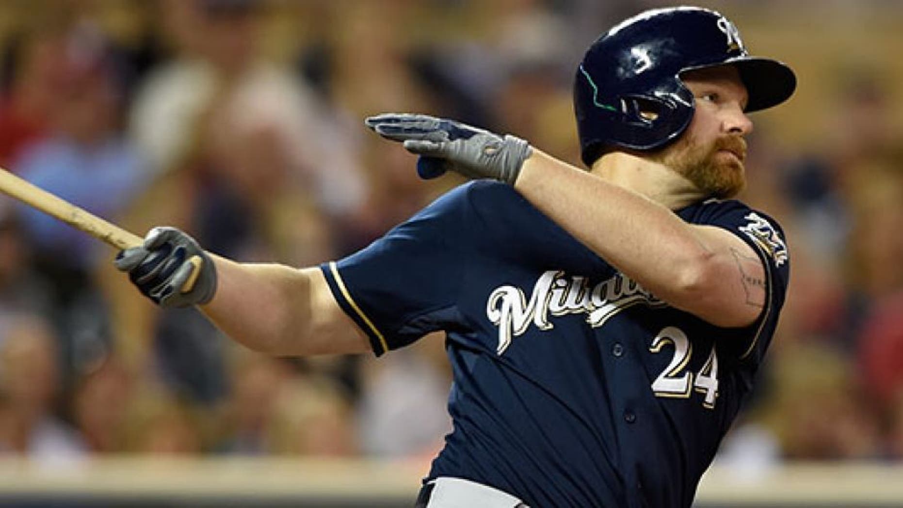 MINNEAPOLIS, MN - JUNE 5: Adam Lind #24 of the Milwaukee Brewers hits an RBI double against the Minnesota Twins during the eighth inning of the game on June 5, 2015 at Target Field in Minneapolis, Minnesota. The Brewers defeated the Twins 10-5. (Photo by Hannah Foslien/Getty Images)