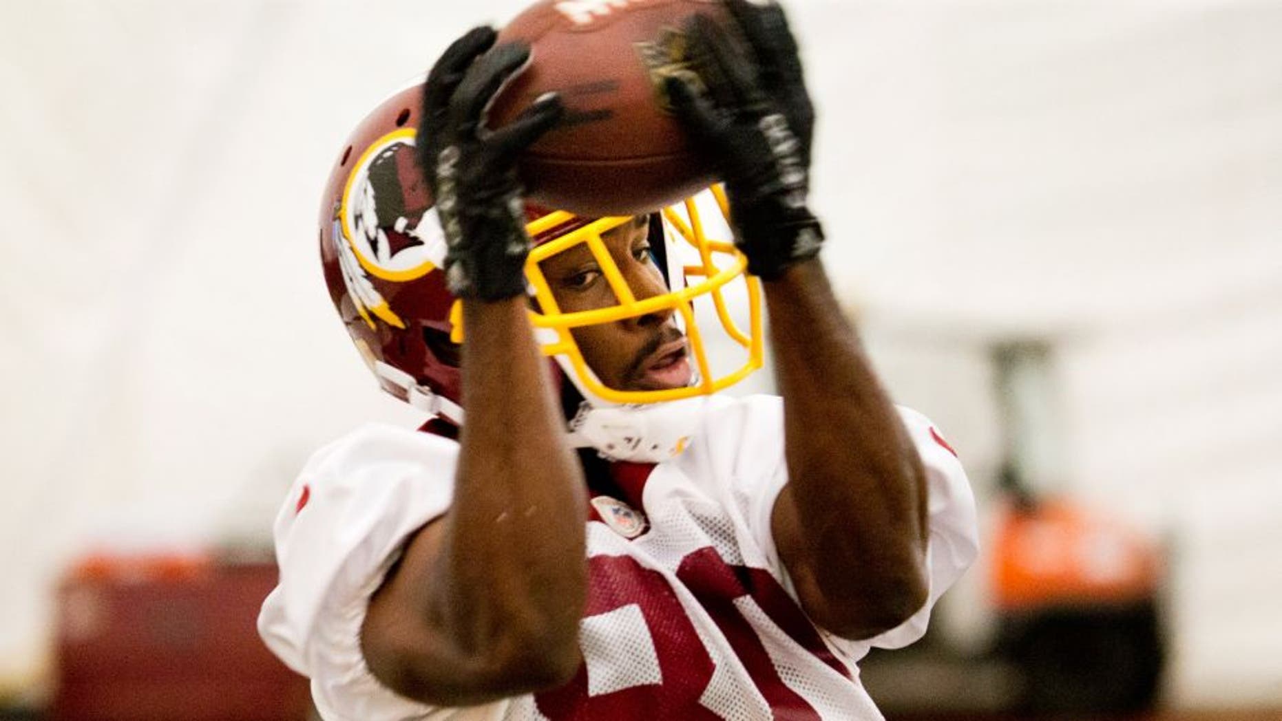 Washington Redskins' Jamison Crowder catches a pass during an NFL football organized team activity at Redskins Park, Wednesday, June 3, 2015, in Ashburn, Va. (AP Photo/Pablo Martinez Monsivais)