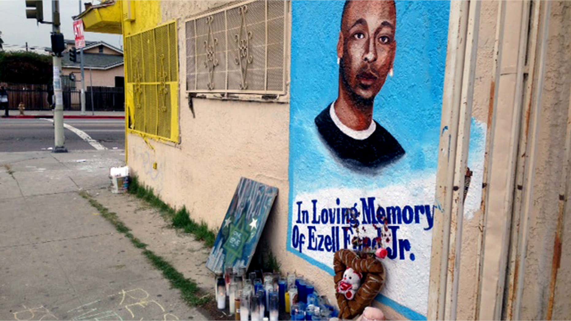 Dec. 30, 2014: a street side memorial with a painted portrait of Ezell Ford near where he was shot when police confronted him on Aug. 11, 2014, is shown on a street near his home in South Los Angeles.