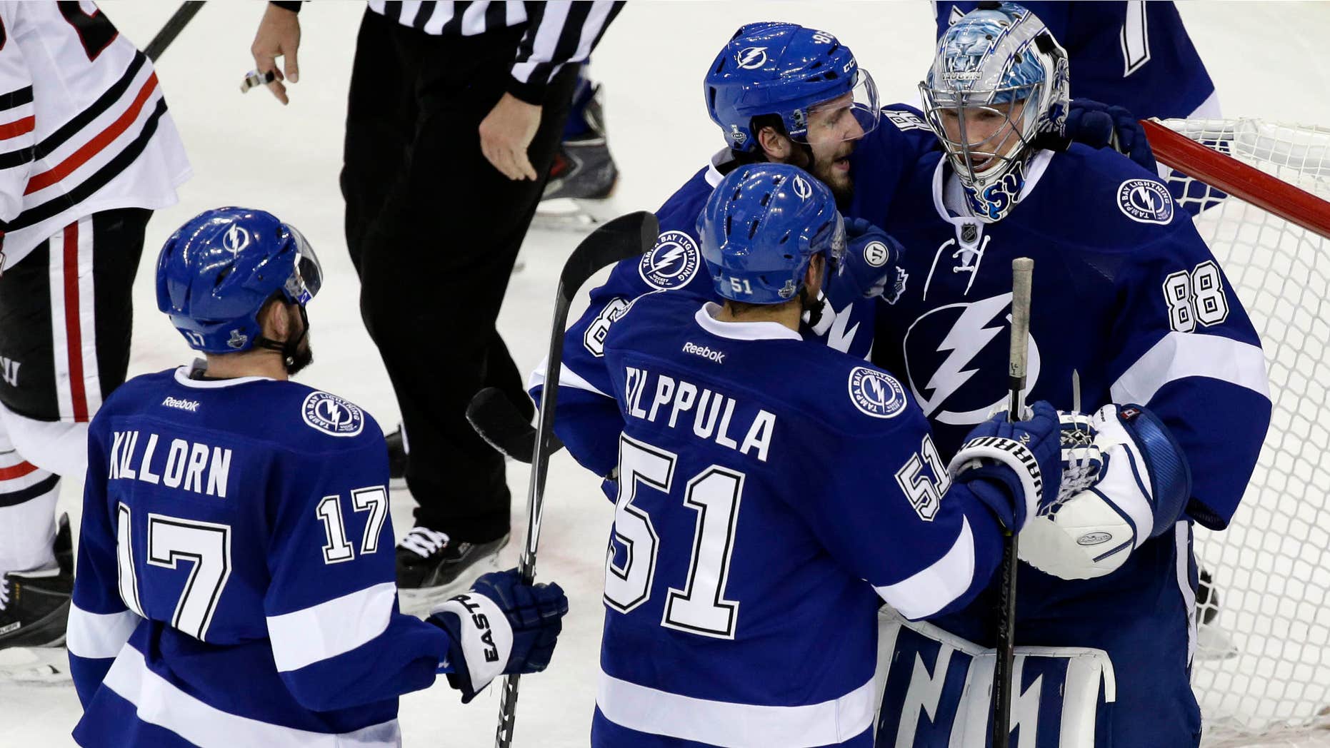 June 6, 2015: Tampa Bay Lightning players greet backup goalie Andrei Vasilevskiy after their win against the Chicago Blackhawks in Game 2 of the NHL hockey Stanley Cup Final.