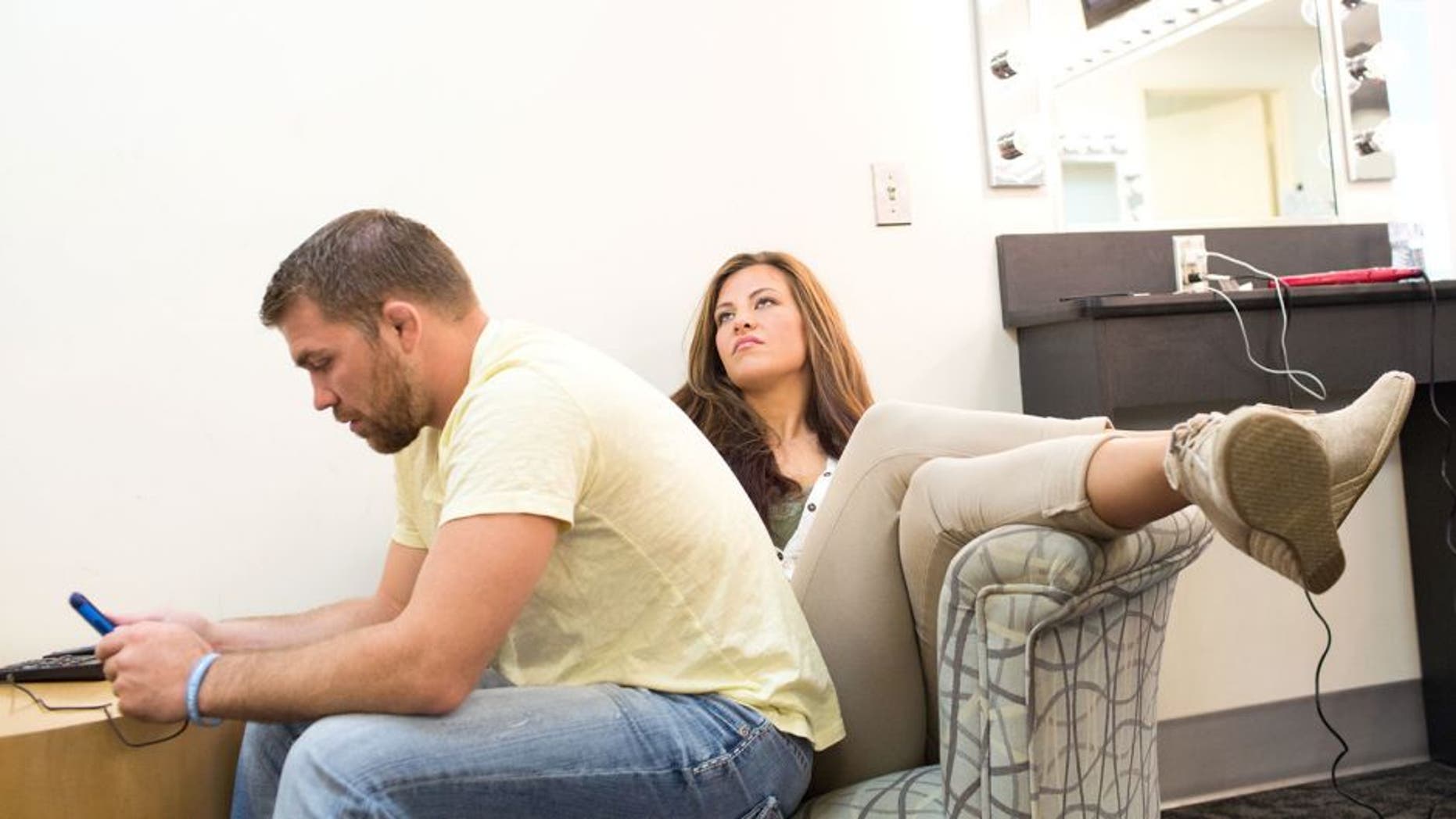BRISTOL, CT - AUGUST 1: UFC bantamweight fighter Miesha Tate waits in the makeup room with her boyfriend Bryan Caraway, also a UFC fighter, at ESPN's headquarters on August 1, 2013, in Bristol, Connecticut. Tate will battle bantamweight champion Ronda Rousey in December for the title. The two were interviewed on Sportscenter, by ESPN.com, by ESPN W, on the Dan Lebatard Show and on ESPN Deportes. (Photo by Christopher Capozziello/Zuffa LLC via Getty Images)