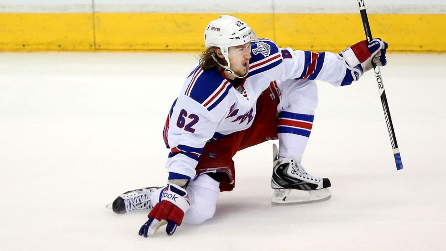 LOS ANGELES, CA - JUNE 04: Carl Hagelin #62 of the New York Rangers celebrates after he scores a first period goal against the Los Angeles Kings during Game One of the 2014 NHL Stanley Cup Final at the Staples Center on June 4, 2014 in Los Angeles, California. (Photo by Victor Decolongon/Getty Images)