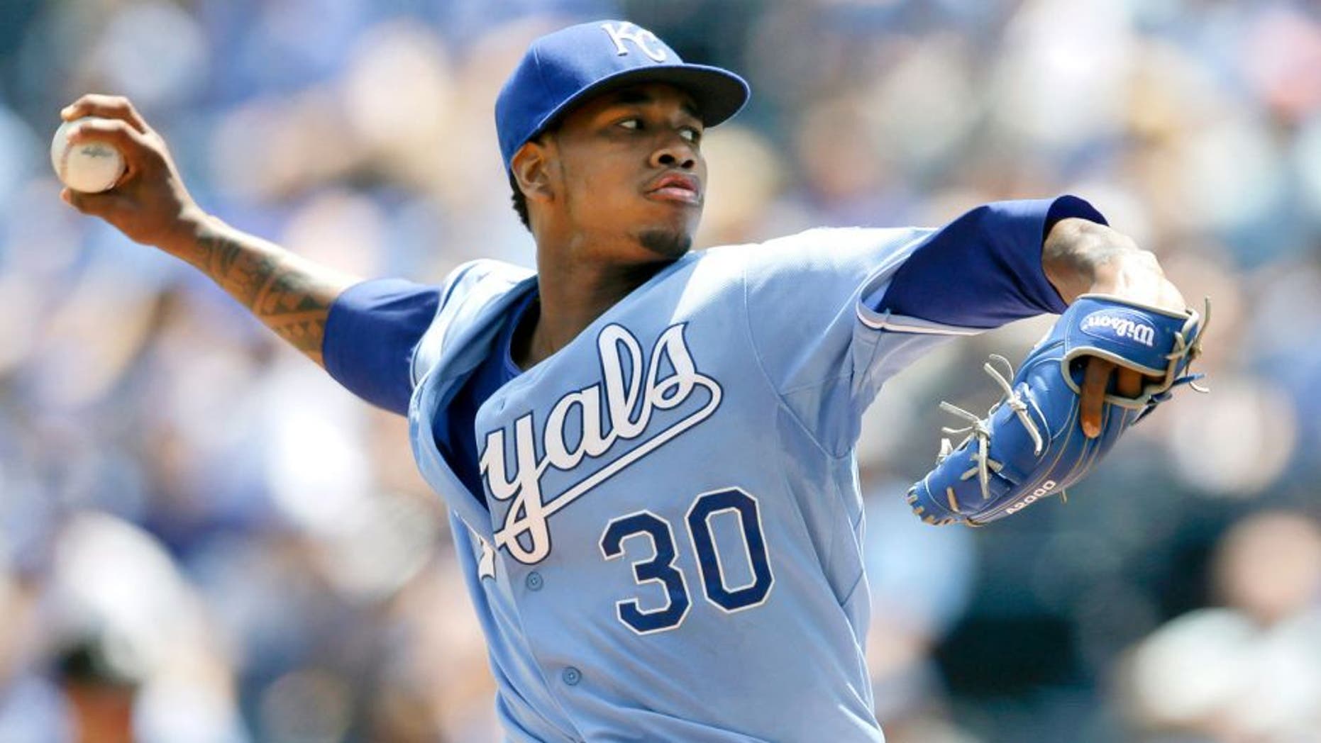 Kansas City Royals starting pitcher Yordano Ventura delivers to a Texas Rangers batter during the first inning of a baseball game at Kauffman Stadium in Kansas City, Mo., Saturday, June 6, 2015. (AP Photo/Orlin Wagner)