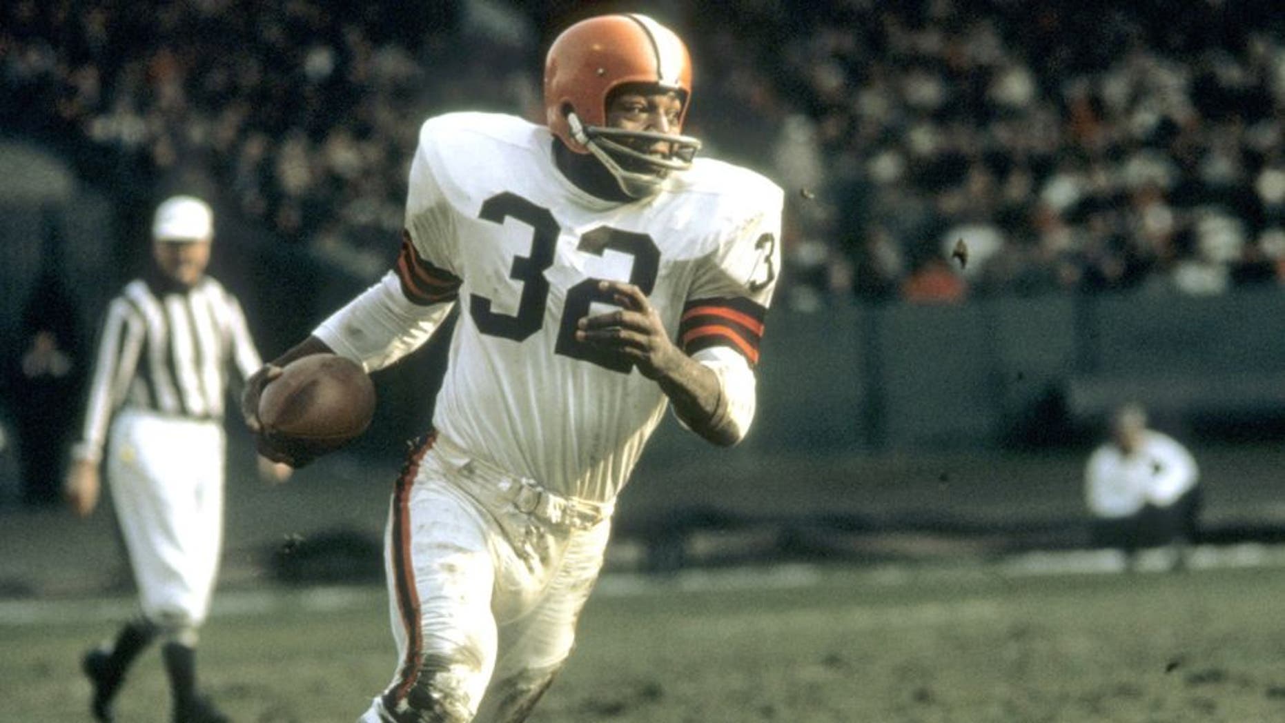 CLEVELAND, OH - 1960: Runningback Jim Brown #32 of the Cleveland Browns runs with the ball during a game in the 1960's at Municipal Stadium in Cleveland, Ohio. (Photo by: Tony Tomsic/Getty Images)