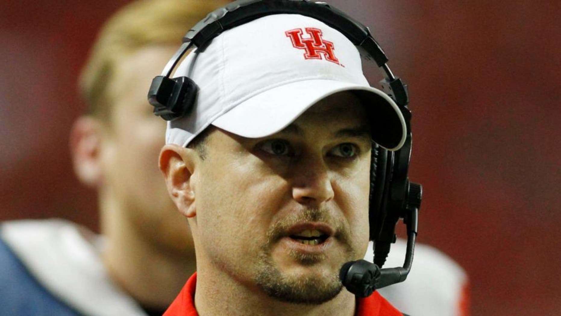 Dec 31, 2015; Atlanta, GA, USA; Houston Cougars head coach Tom Herman looks on from the sidelines against the Florida State Seminoles in the fourth quarter in the 2015 Chick-fil-A Peach Bowl at the Georgia Dome. The Cougars won 38-24. Mandatory Credit: Brett Davis-USA TODAY Sports