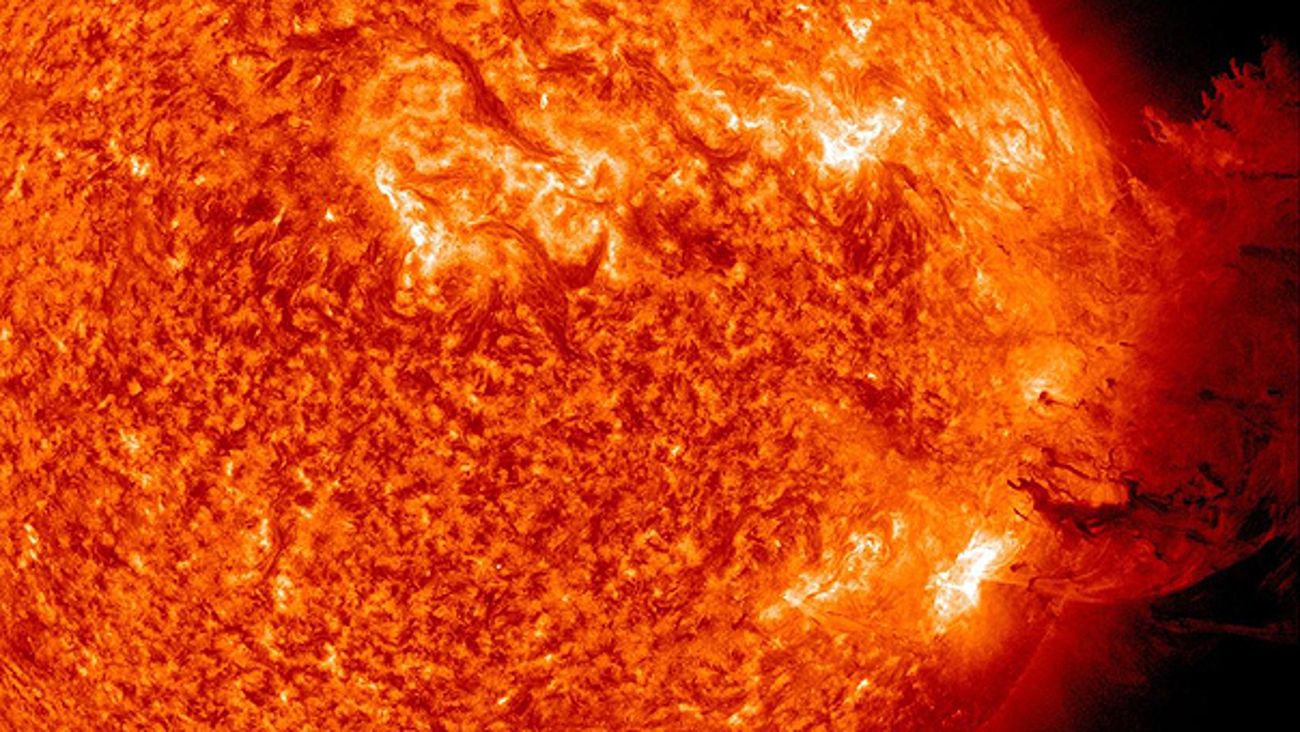 June 7: This image provided by NASA shows the Sun unleashing a medium-sized solar flare, a minor radiation storm and a spectacular coronal mass ejection.