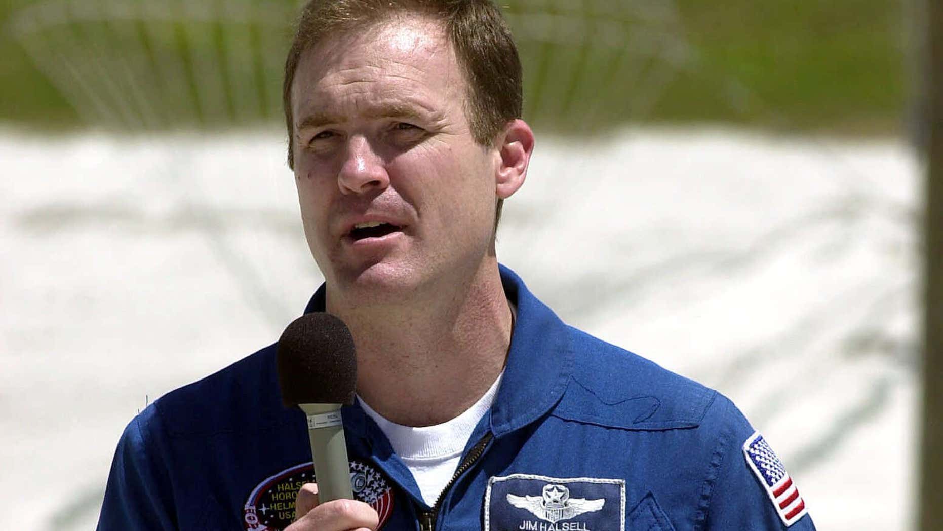 FILE -In this Thursday, April 6, 2000 file photo, Space shuttle Atlantis mission commander James Halsell Jr. speaks to reporters at the Kennedy Space Center in Cape Canaveral, Fla, about a problem with the Atlantis.