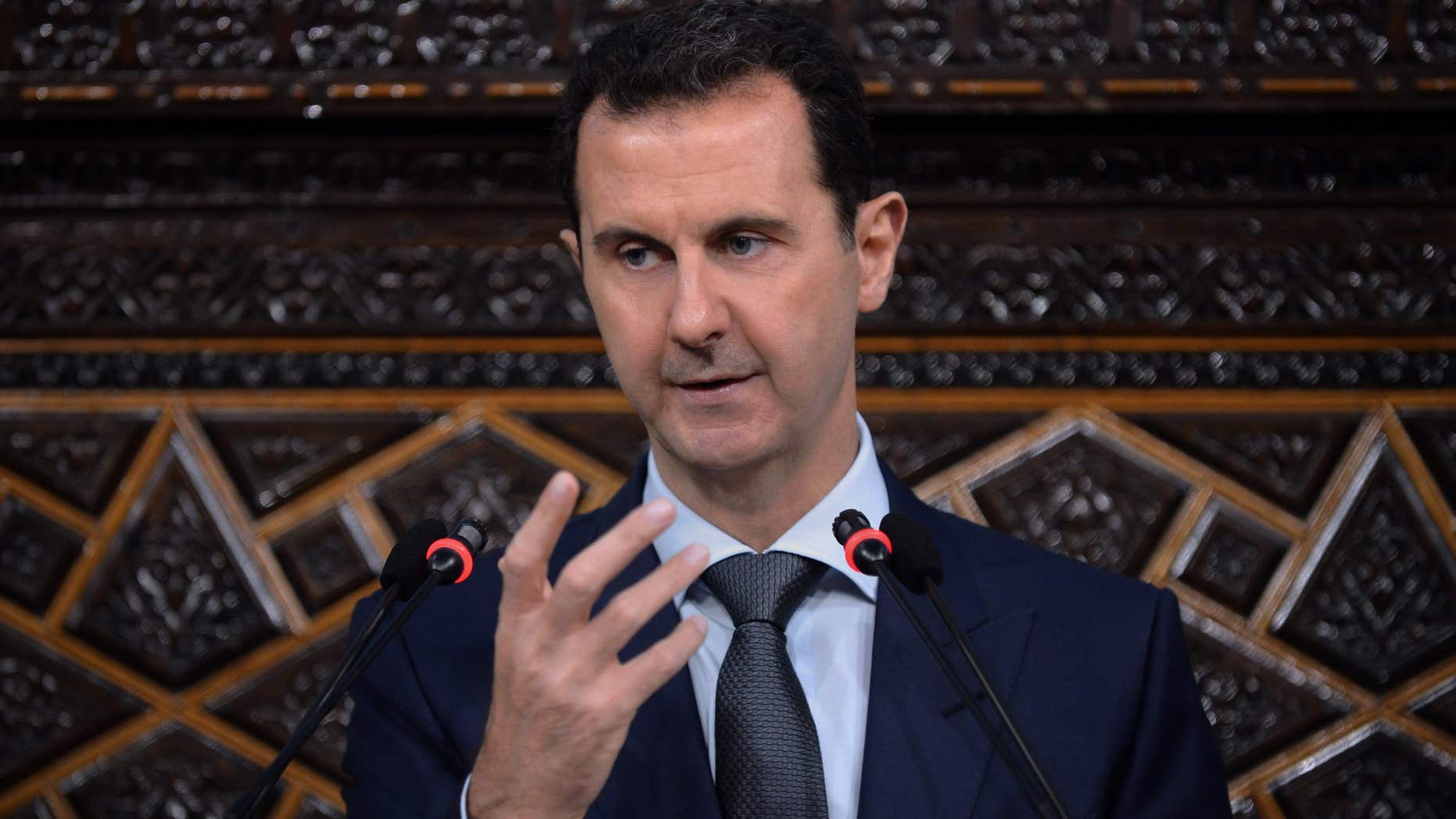 June 7, 2016: In this photo released by the Syrian official news agency SANA, Syrian President Bashar Assad, addresses a speech to the newly-elected parliament at the parliament building, in Damascus, Syria.