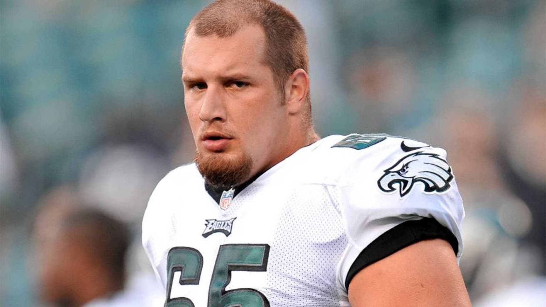 Aug 9, 2013; Philadelphia, PA, USA; Philadelphia Eagles offensive tackle Lane Johnson (65) looks on before the first half of a preseason game against the New England Patriots at Lincoln Financial Field. The Patriots won 31-22. Mandatory Credit: Joe Camporeale-USA TODAY Sports