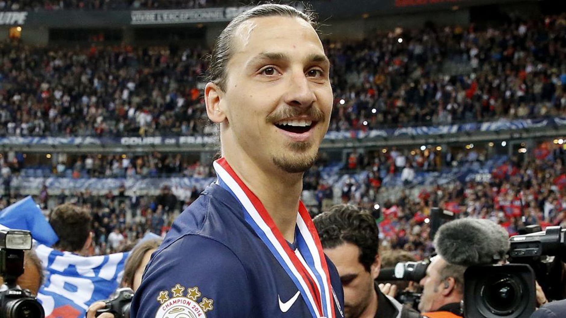 PARIS, FRANCE - MAY 30: Zlatan Ibrahimovic of PSG celebrates the victory after the French Cup Final between Paris Saint-Germain (PSG) and AJ Auxerre at Stade de France on May 30, 2015 in Saint-Denis nearby Paris, France. (Photo by Jean Catuffe/Getty Images)