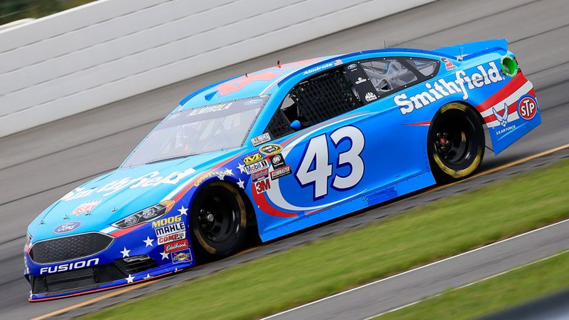 LONG POND, PA - JUNE 03: Aric Almirola, driver of the #43 Smithfield Ford, qualifies for the NASCAR Sprint Cup Series Axalta "We Paint Winners" 400 at Pocono Raceway on June 3, 2016 in Long Pond, Pennsylvania. (Photo by Chris Trotman/NASCAR via Getty Images)