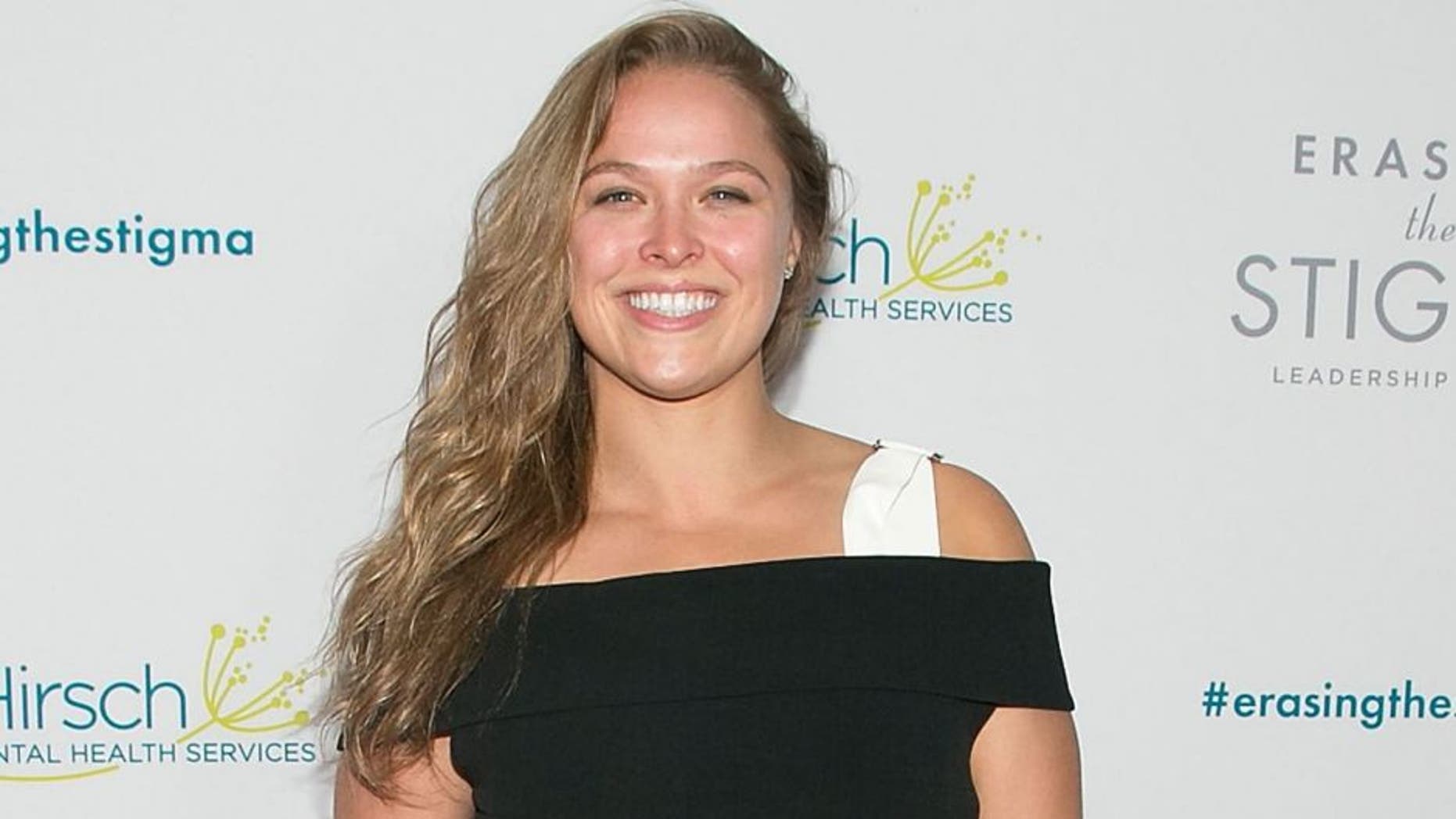 BEVERLY HILLS, CA - APRIL 28: Ronda Rousey arrives for the 20th Anniversary Erasing The Stigma Leadership Awards at The Beverly Hilton Hotel on April 28, 2016 in Beverly Hills, California. (Photo by Gabriel Olsen/WireImage)
