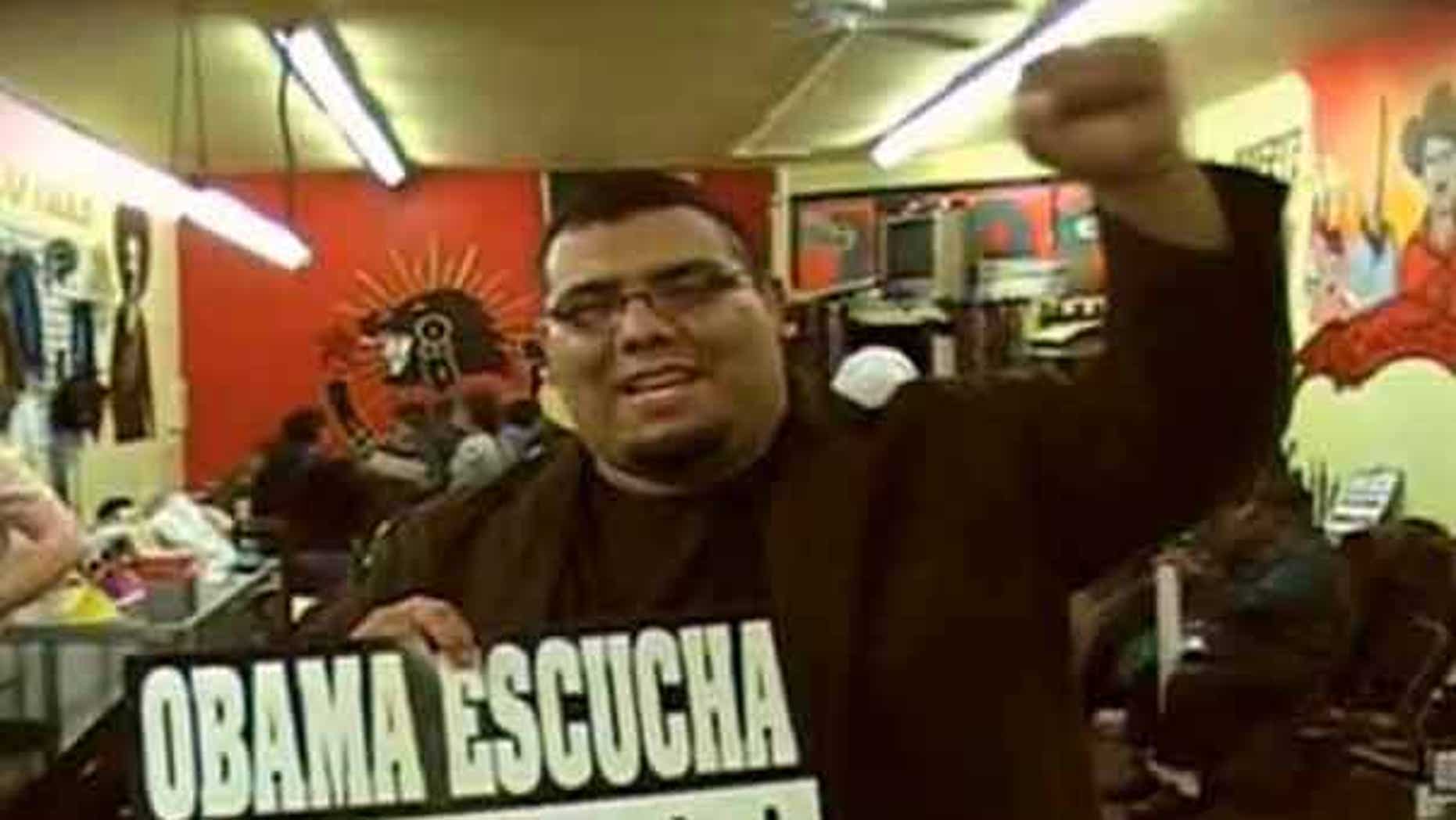 May 28: Jose Lara, a social studies teacher in the Los Angeles Unified School District, took students on an overnight "freedom ride" to Phoenix to protest what he called the "racist and outrageous" new immigration law in Arizona. He is seen above holding a sign in Spanish that reads, 'Listen Obama.'