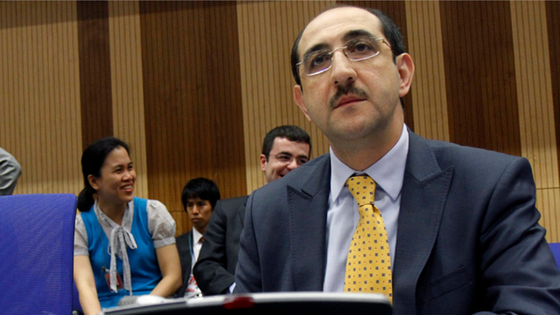 June 6: Syria's ambassador to Austria, Bassam al-Sabbagh, waits for the start of the board of governors meeting of the International Atomic Energy Agency, IAEA, at the International Center, in Vienna, Austria.