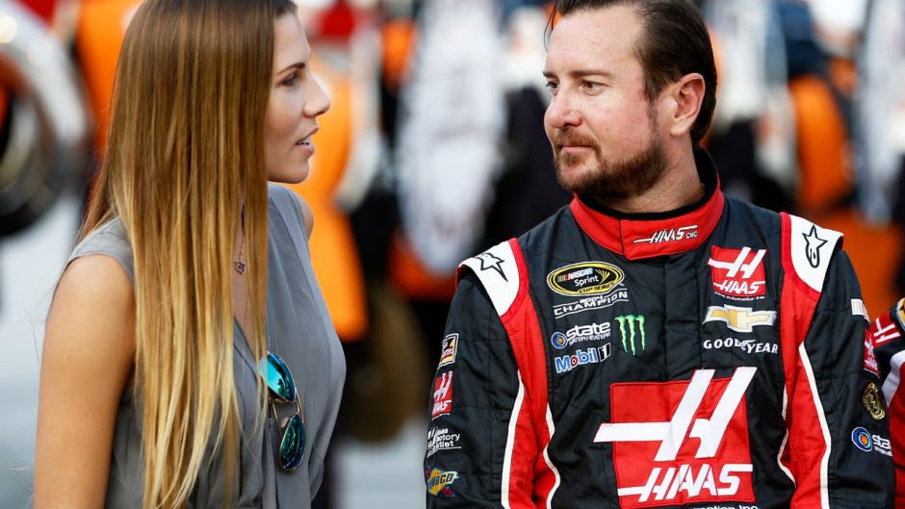 BRISTOL, TN - AUGUST 22: Kurt Busch, driver of the #41 Haas Automation Chevrolet, talks to his girlfriend, Ashley Van Metre, prior to the NASCAR Sprint Cup Series IRWIN Tools Night Race at Bristol Motor Speedway on August 22, 2015 in Bristol, Tennessee. (Photo by Jeff Zelevansky/Getty Images)