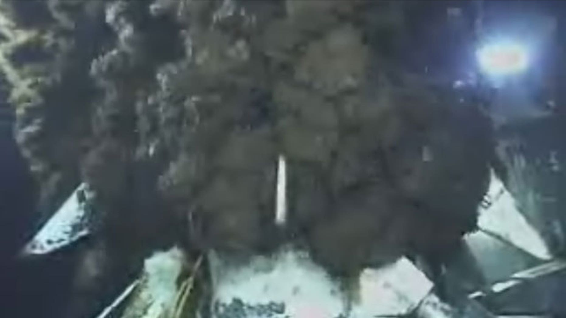 June 10: This image from video provided by BP PLC shows oil continuing to pour out at the site of the Deepwater Horizon oil well in the Gulf of Mexico.