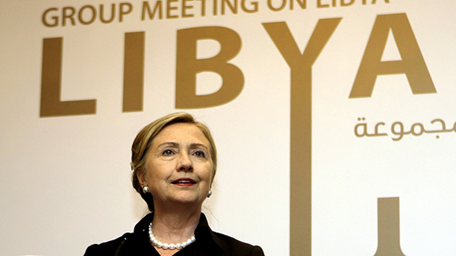 June 9: Secretary of State Hillary Clinton talks to journalists during the third meeting of Contact Group on Libya in Abu Dhabi, United Arab Emirates.