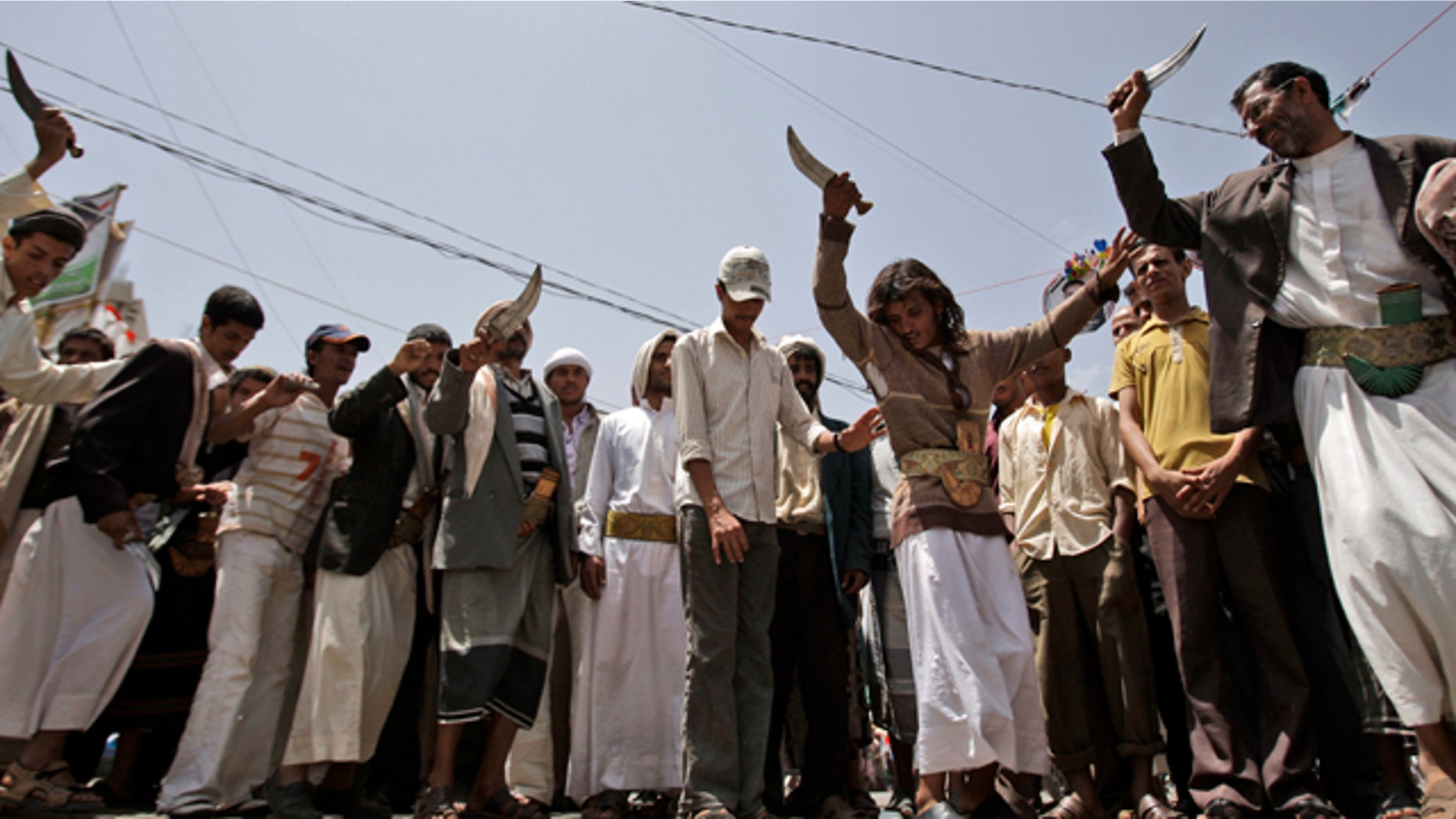 June 9: Anti-government protestors dance holding up daggers during a demonstration demanding the resignation of Yemeni President Ali Abdullah Saleh, in Sanaa, Yemen.
