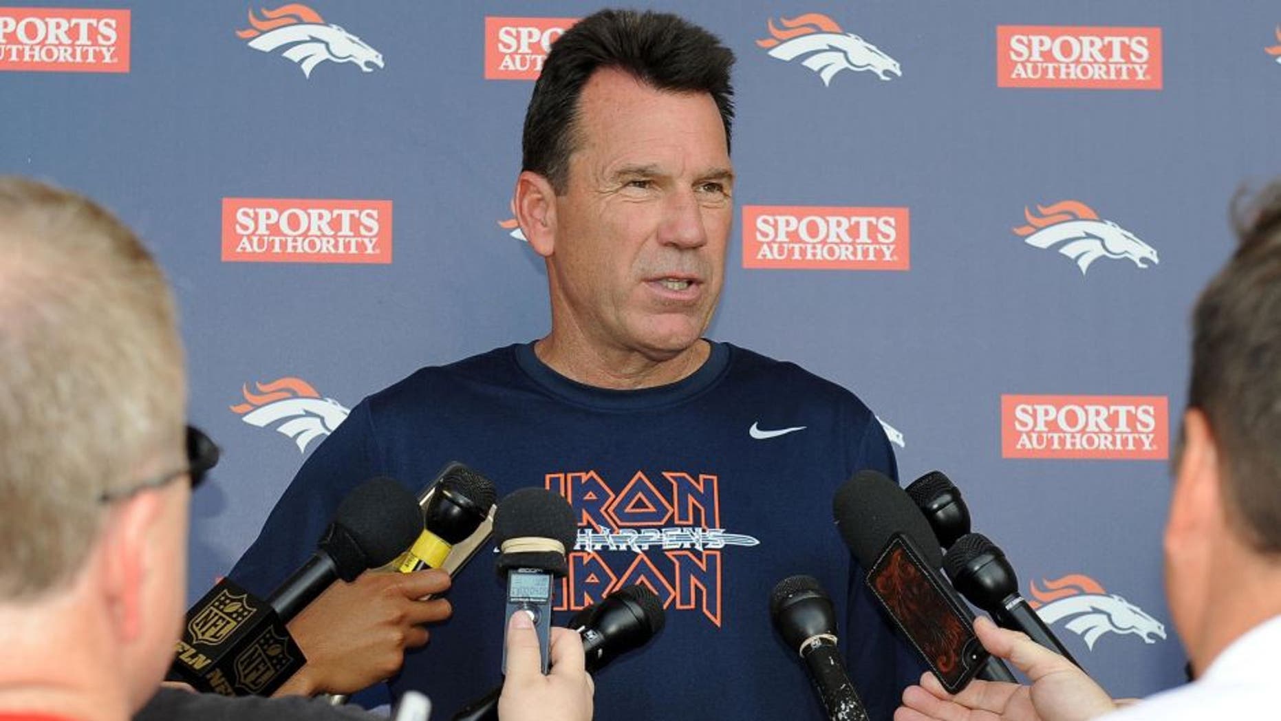 June 9, 2015; Englewood, CO, USA; Denver Broncos head coach Gary Kubiak speaks to the media following mini camp activities at the Broncos training facility. Mandatory Credit: Ron Chenoy-USA TODAY Sports
