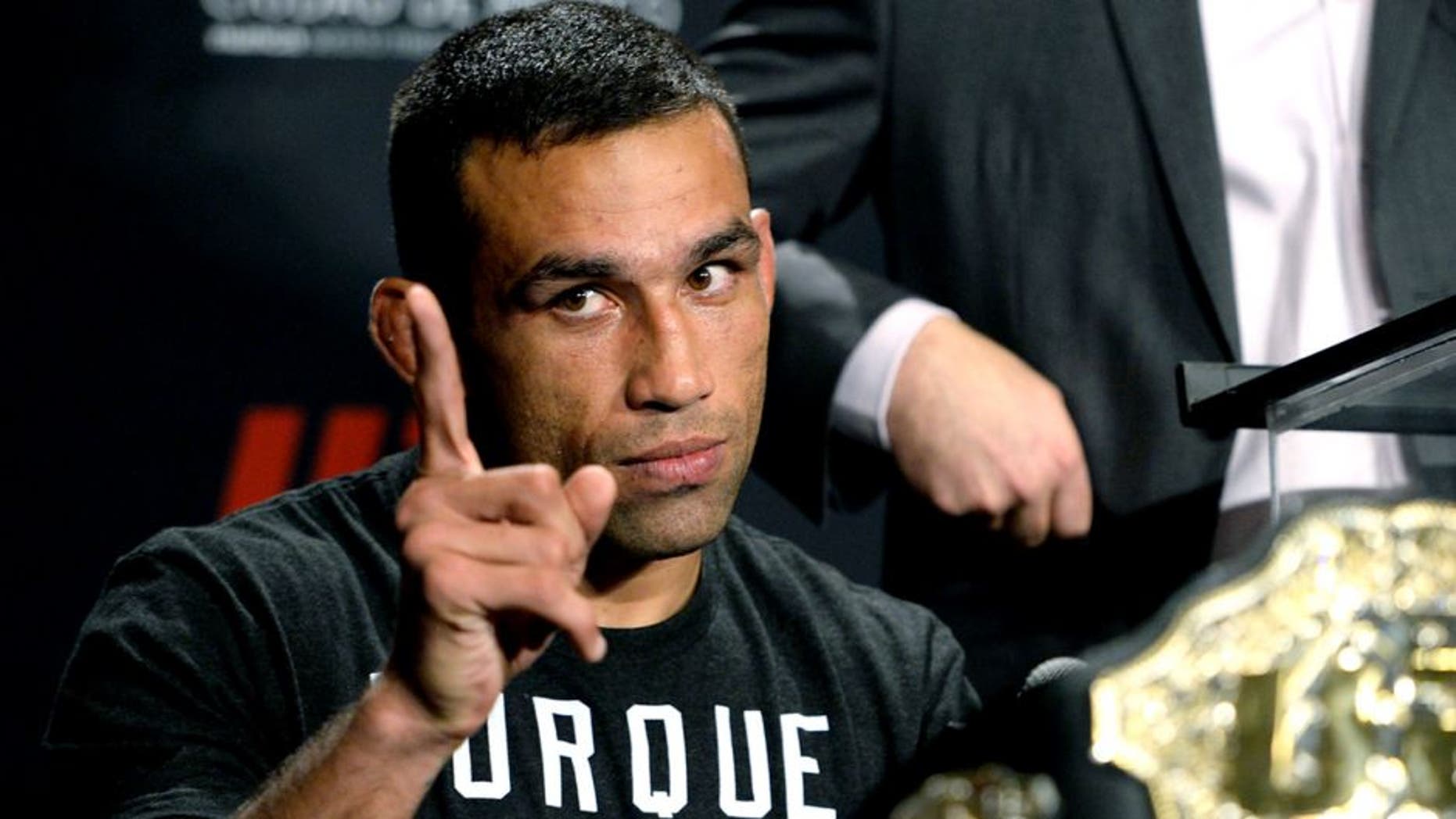 MEXICO CITY, MEXICO - NOVEMBER 15: Interim UFC heavyweight champion Fabricio Werdum interacts with the media during the UFC 180 post fight press conference inside the Arena Ciudad de Mexcio on November 15, 2014 in Mexico City, Mexico. (Photo by Jeff Bottari/Zuffa LLC/Zuffa LLC via Getty Images