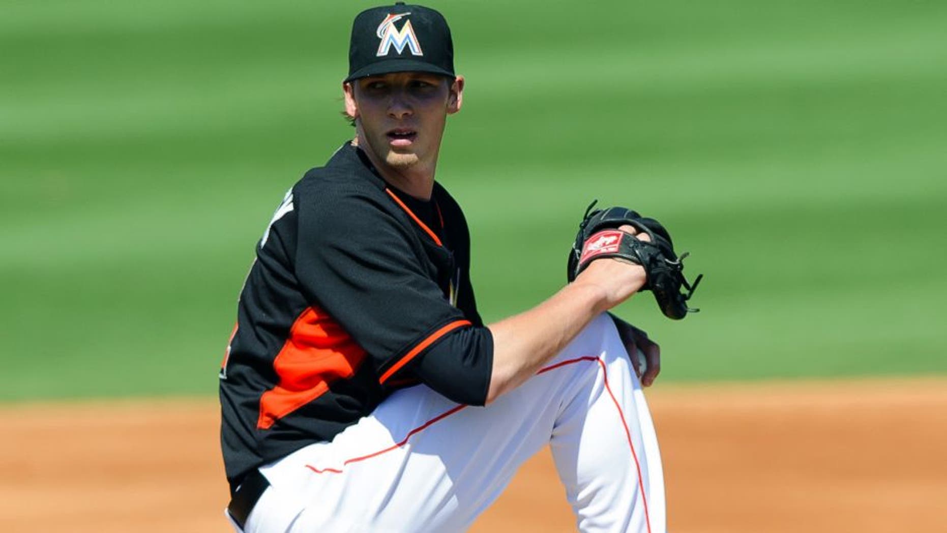 Mar 4, 2014; Jupiter, FL, USA; Miami Marlins starting pitcher Adam Conley (71) delivers a pitch against the Minnesota Twins during a spring training game at Roger Dean Stadium. Mandatory Credit: Steve Mitchell-USA TODAY Sports