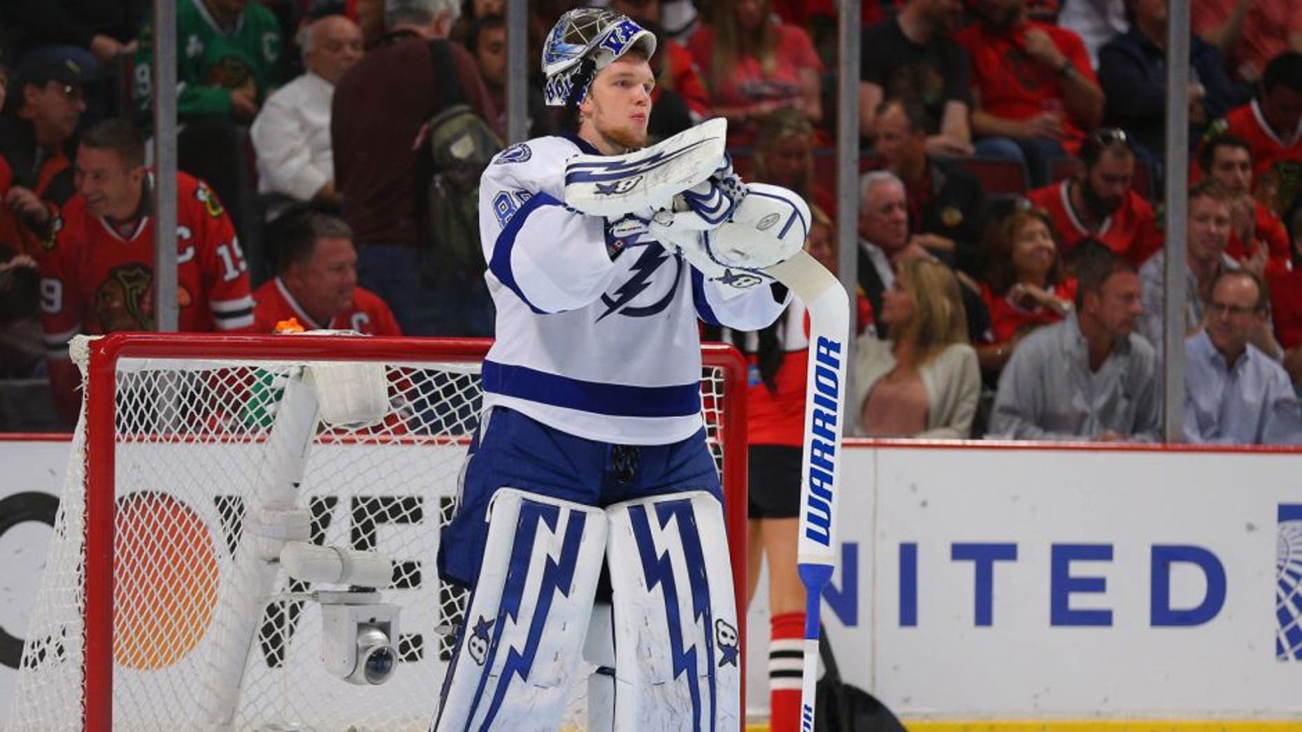 Jun 10, 2015; Chicago, IL, USA; Tampa Bay Lightning goalie Andrei Vasilevskiy (88) during a break in the second period in game four of the 2015 Stanley Cup Final against the Chicago Blackhawks at United Center. Mandatory Credit: Dennis Wierzbicki-USA TODAY Sports