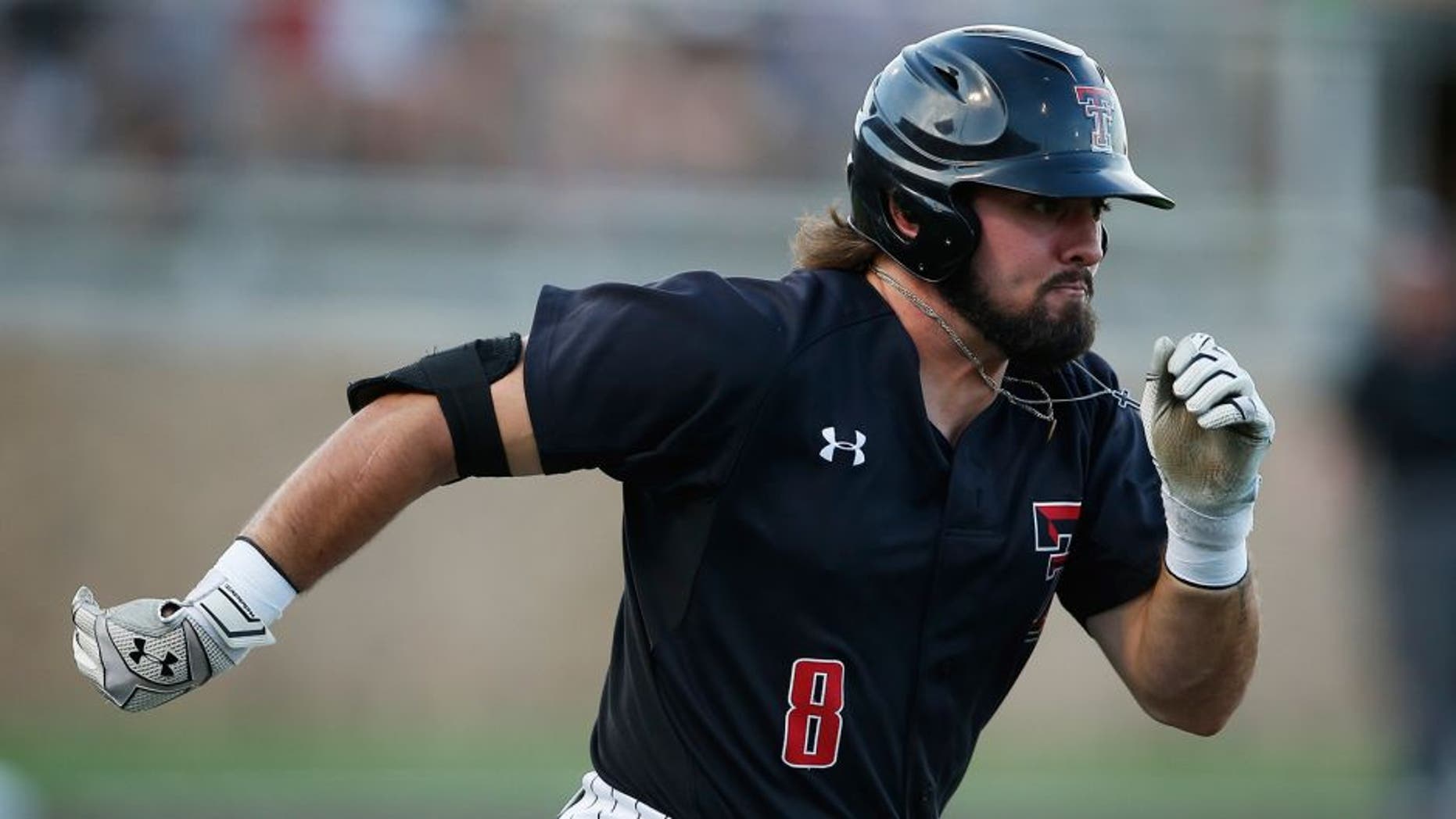 Texas Tech's Tanner Gardner runs to first on a single against East Carolina during an NCAA college baseball tournament super regional game Friday, June 10, 2016, in Lubbock, Texas. (Brad Tollefson/Lubbock Avalanche-Journal via AP) ALL LOCAL TELEVISION OUT; MANDATORY CREDIT