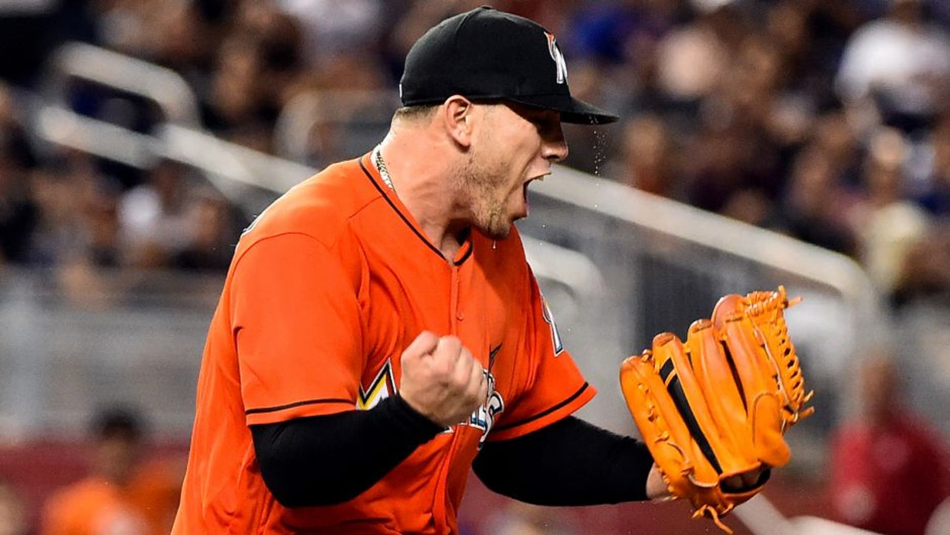 Jun 5, 2016; Miami, FL, USA; Miami Marlins starting pitcher Jose Fernandez (16) reacts on the pitchers mound during the seventh inning against the New York Mets at Marlins Park. The Marlins won 1-0. Mandatory Credit: Steve Mitchell-USA TODAY Sports