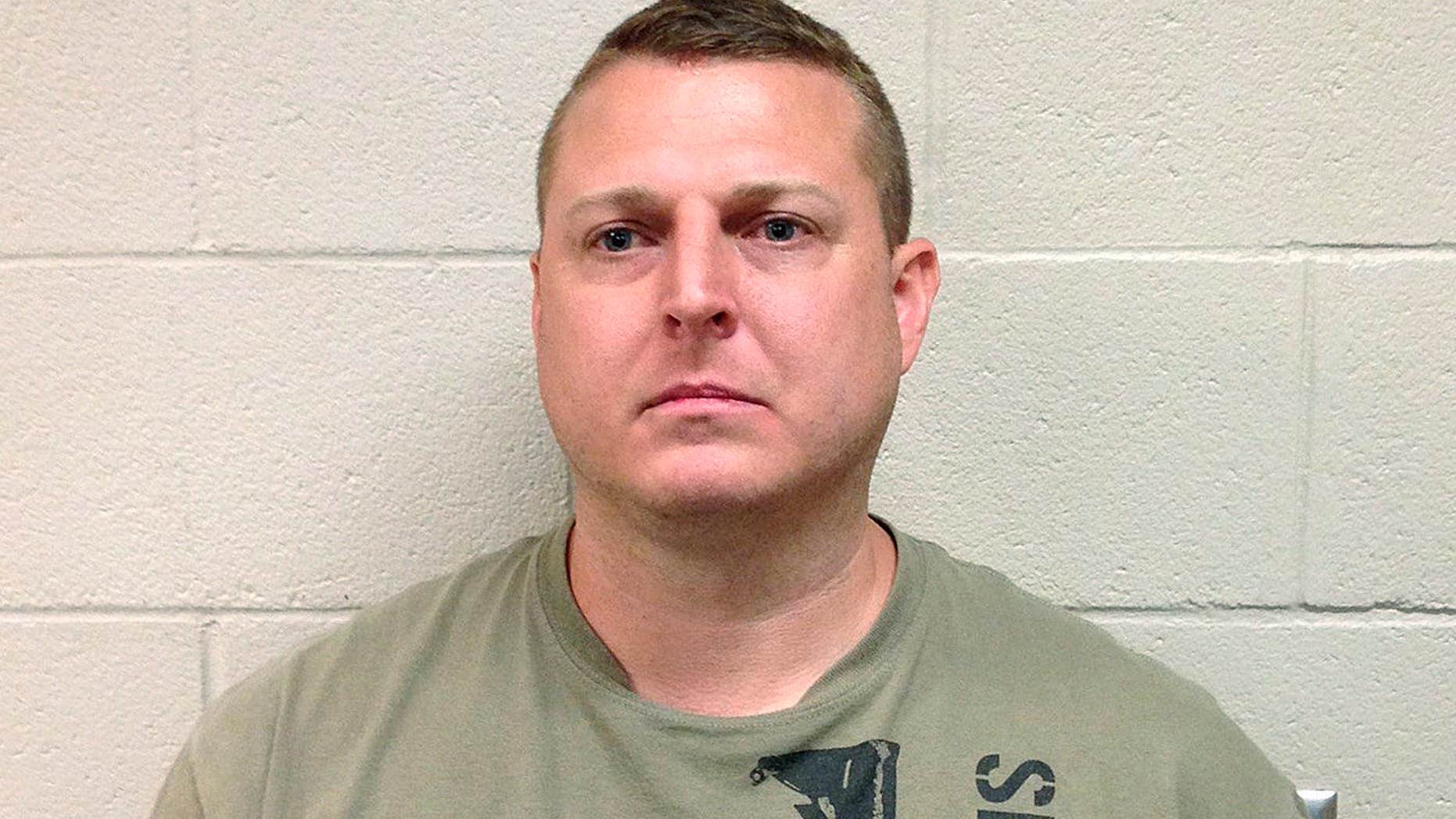 In this June 2016 photo released by the Hoke County (N.C.) Sheriff's Office, Thomas Russell Langford poses for a booking photograph.