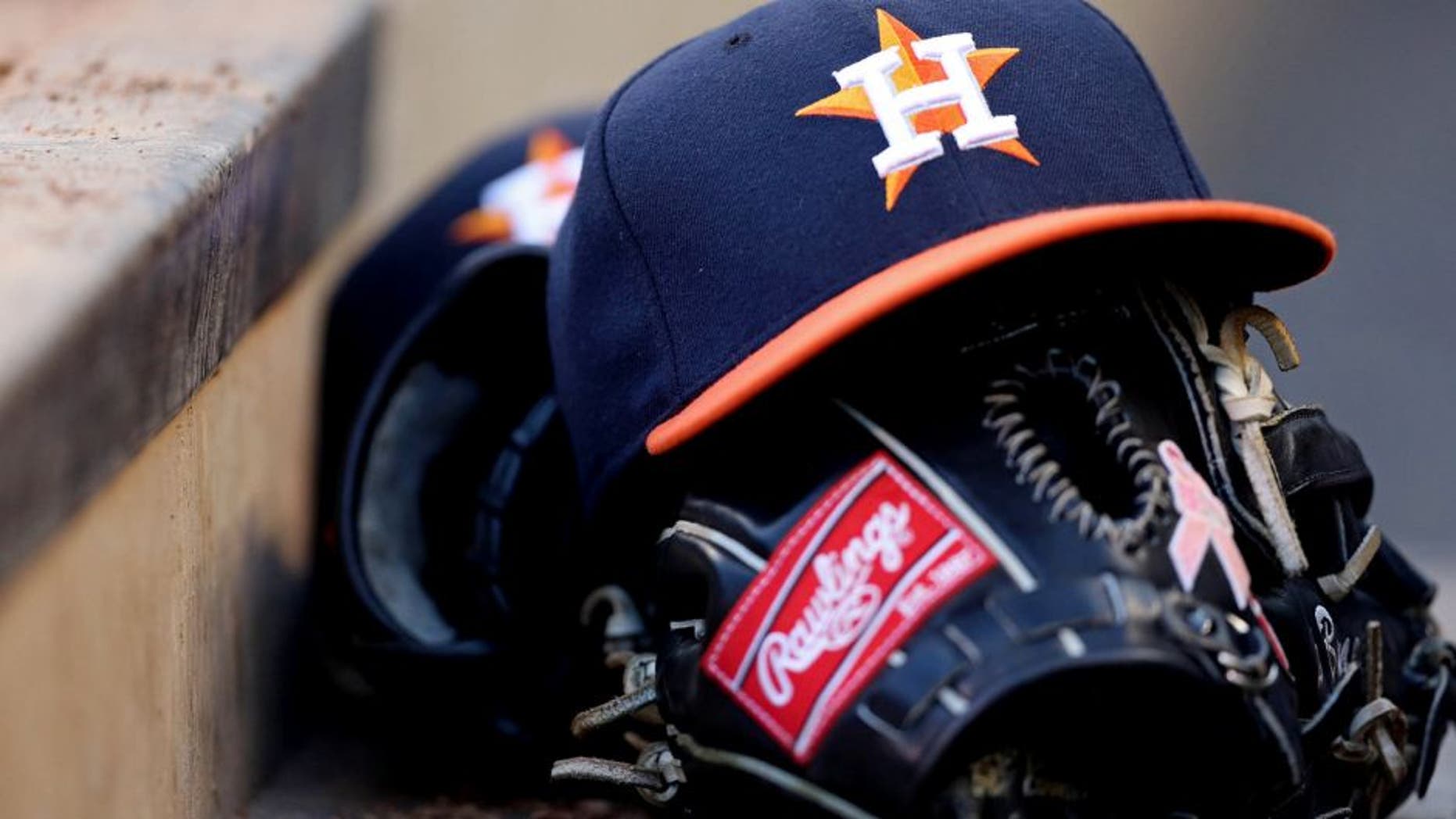 Aug 2, 2013; Minneapolis, MN, USA; A general view of a Houston Astros hat and glove in the dugout during a game against the Minnesota Twins at Target Field. Mandatory Credit: Jesse Johnson-USA TODAY Sports