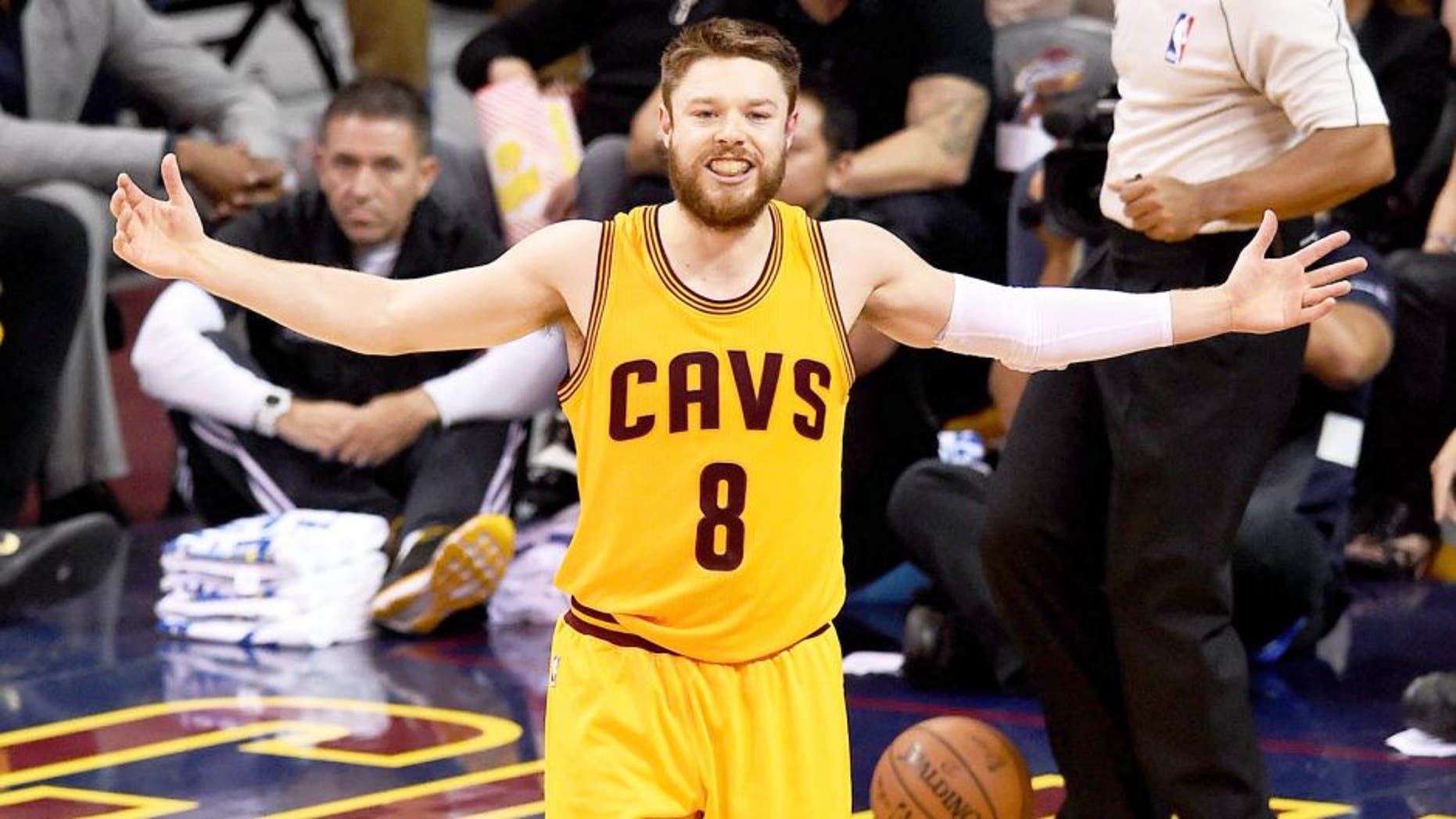 CLEVELAND, OH - JUNE 09: Matthew Dellavedova #8 of the Cleveland Cavaliers reacts against the Golden State Warriors during Game Three of the 2015 NBA Finals at Quicken Loans Arena on June 9, 2015 in Cleveland, Ohio. NOTE TO USER: User expressly acknowledges and agrees that, by downloading and or using this photograph, user is consenting to the terms and conditions of Getty Images License Agreement. (Photo by Jason Miller/Getty Images)