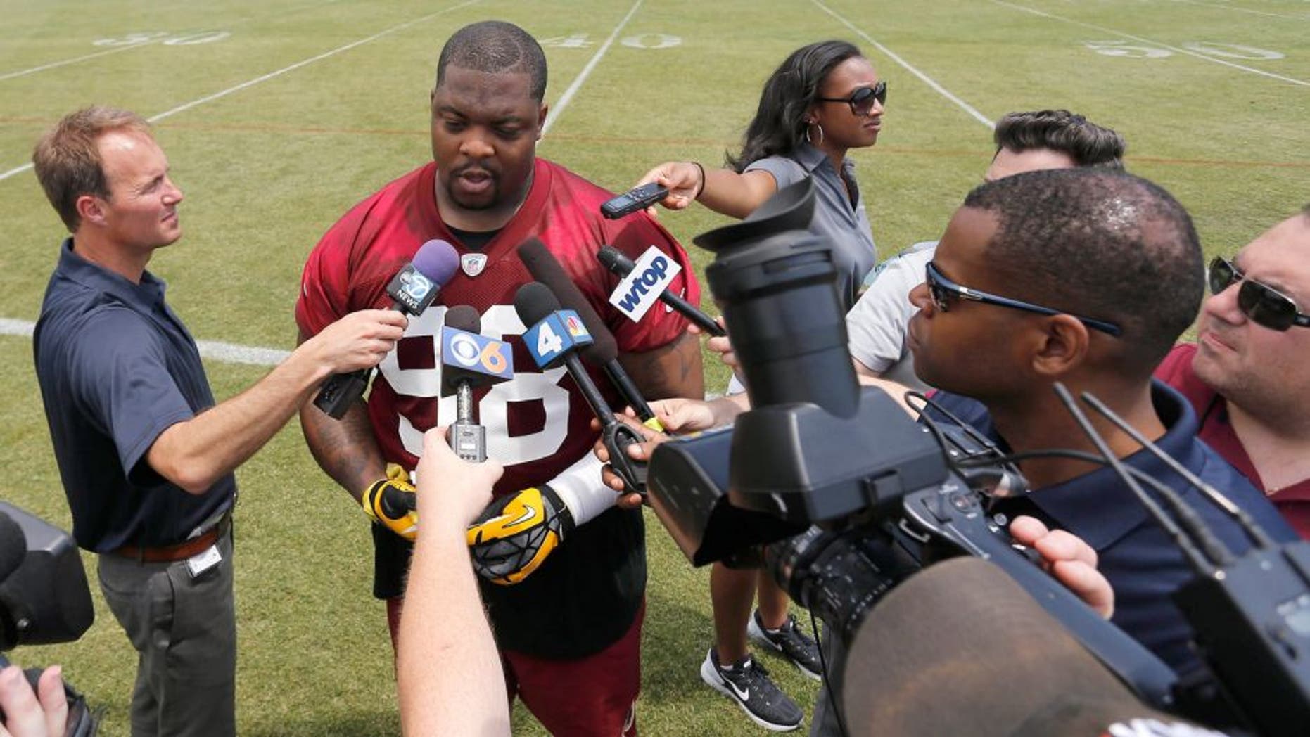 May 26, 2015; Ashbury, VA, USA; Washington Redskins nose tackle Terrance Knighton (98) speaks with the media after the Redskins OTA at Redskins Park. Mandatory Credit: Geoff Burke-USA TODAY Sports