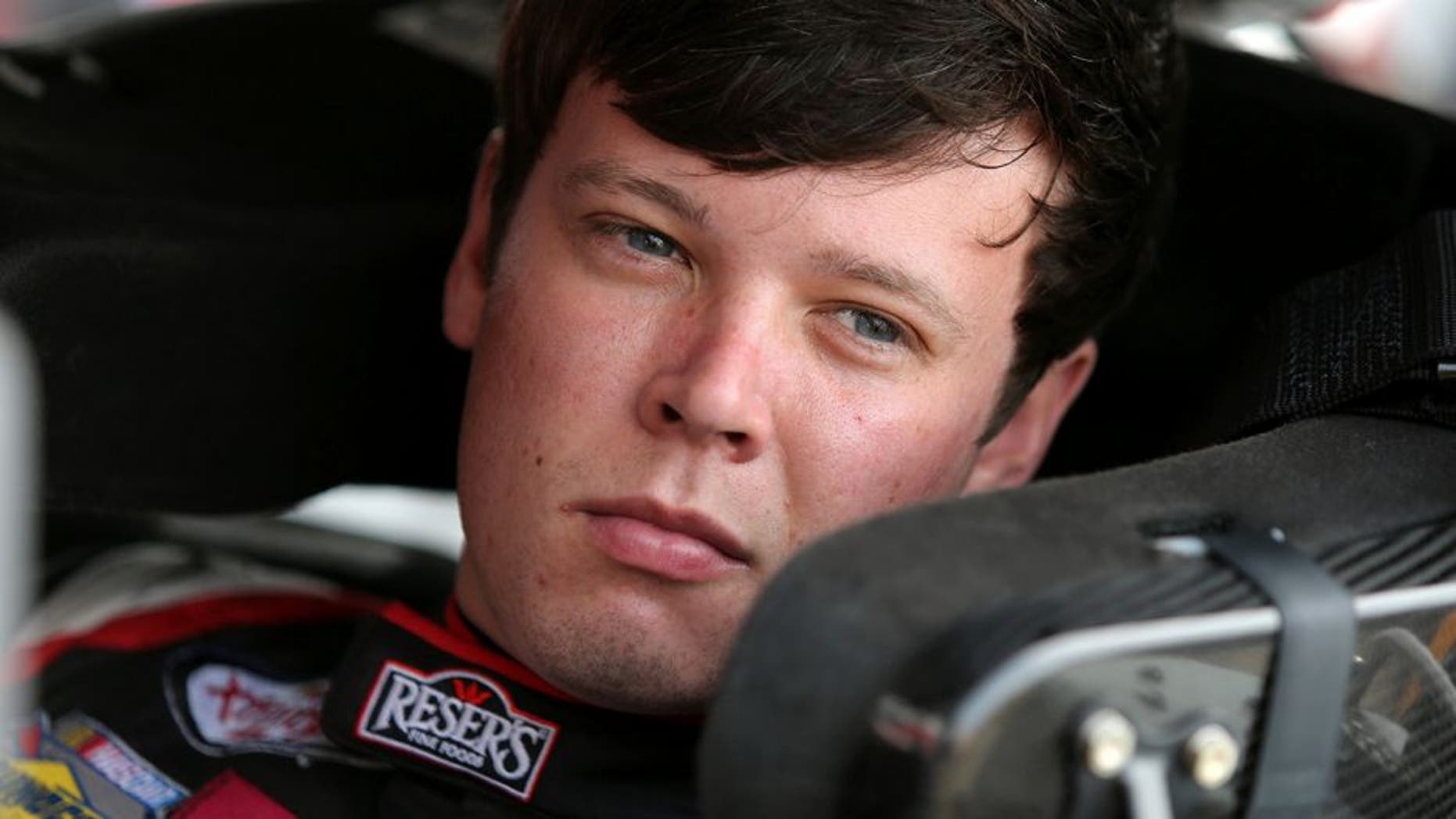 BROOKLYN, MI - JUNE 10: Erik Jones, driver of the #20 Reser's Fine Foods Toyota, sits in his car during practice for the NASCAR XFINITY Series Menards 250 at Michigan International Speedway on June 10, 2016 in Brooklyn, Michigan. (Photo by Jerry Markland/Getty Images )