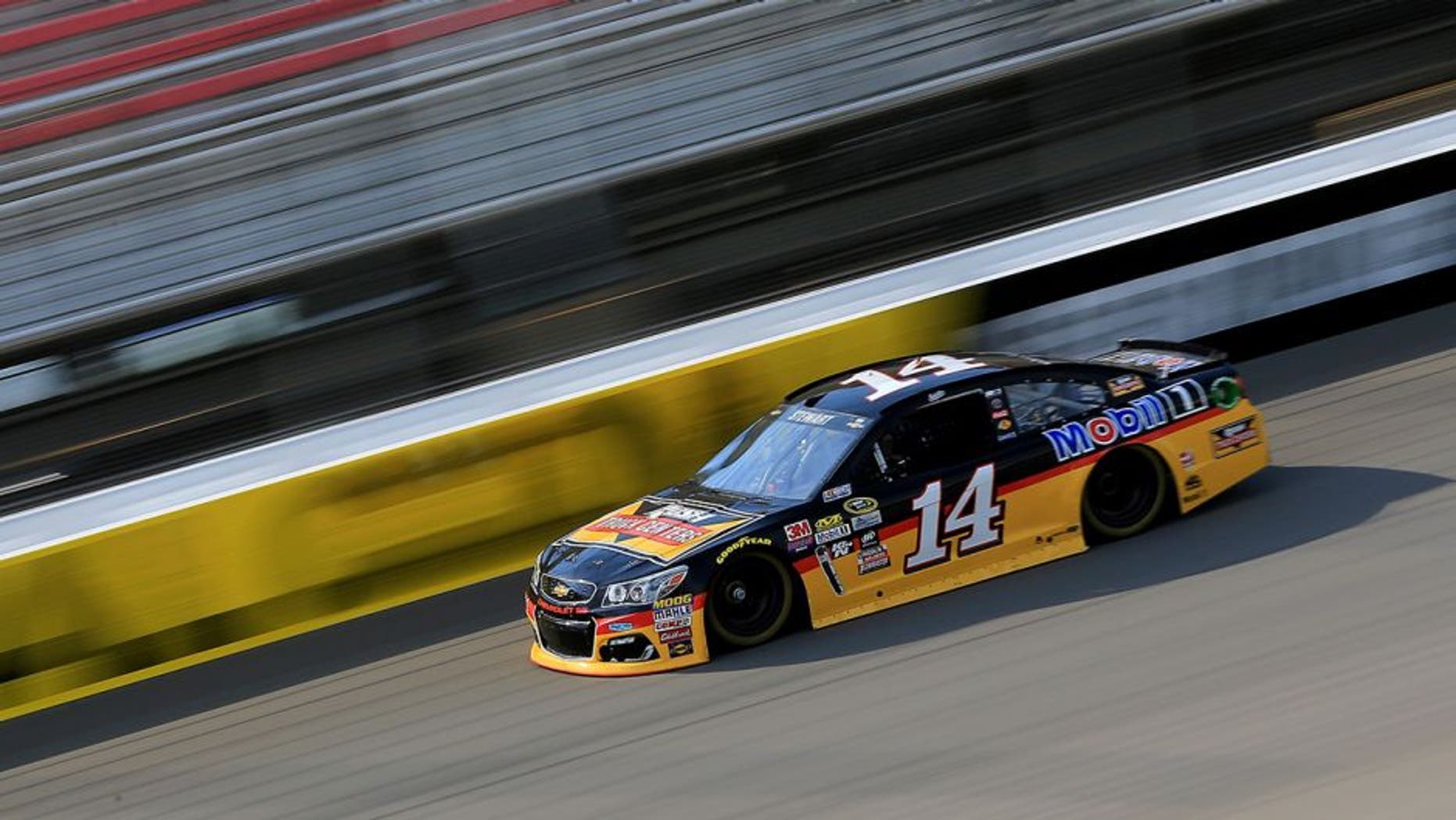 BROOKLYN, MI - JUNE 10: Tony Stewart, driver of the #14 Rush Truck Centers/Mobil 1 Chevrolet, drives during qualifying for the NASCAR Sprint Cup Series FireKeepers Casino 400 at Michigan International Speedway on June 11, 2016 in Brooklyn, Michigan. (Photo by Daniel Shirey/NASCAR via Getty Images)