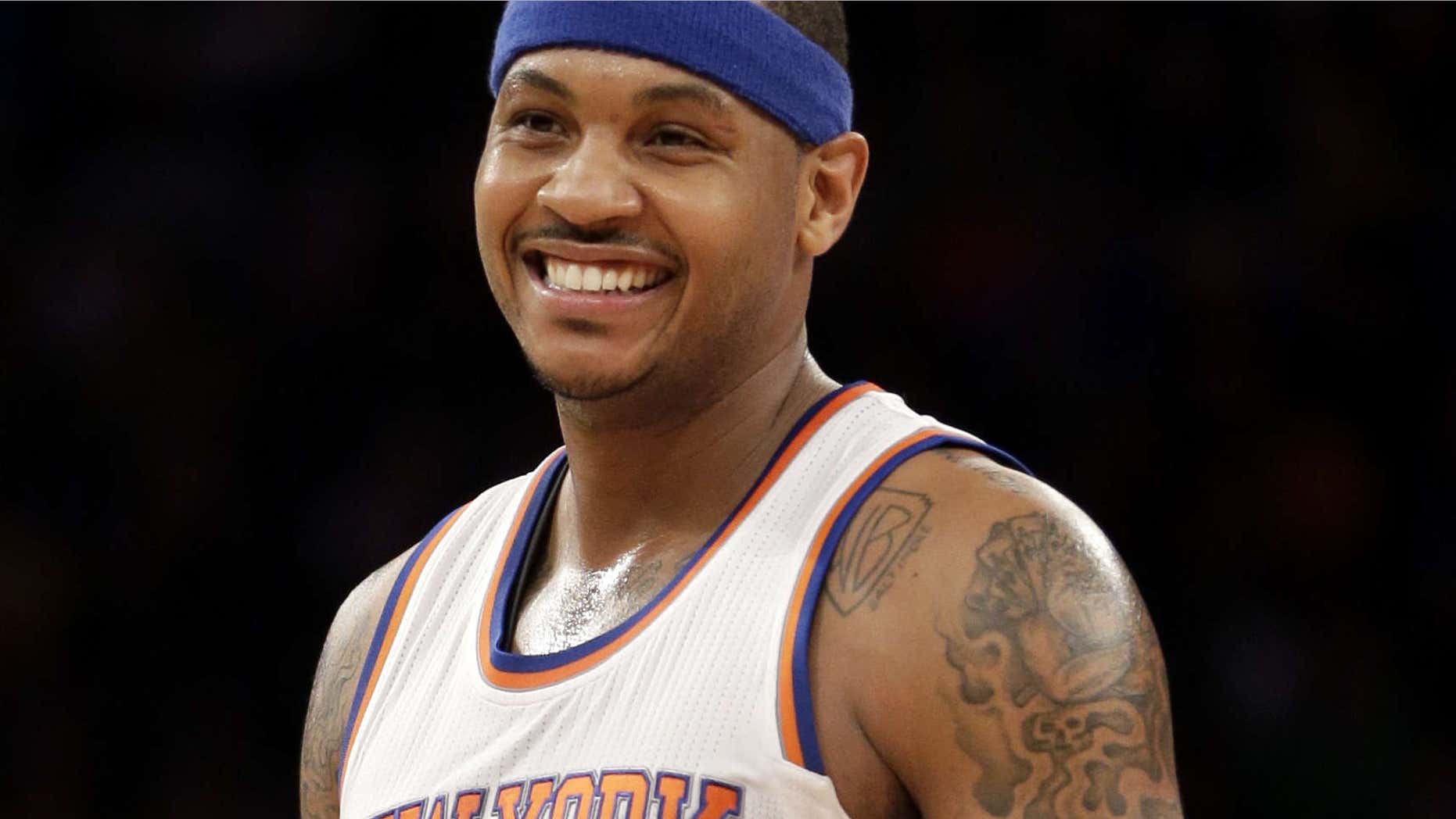 Feb. 1, 2015: New York Knicks' Carmelo Anthony smiles during the second half of the NBA basketball game against the Los Angeles Lakers, in New York.