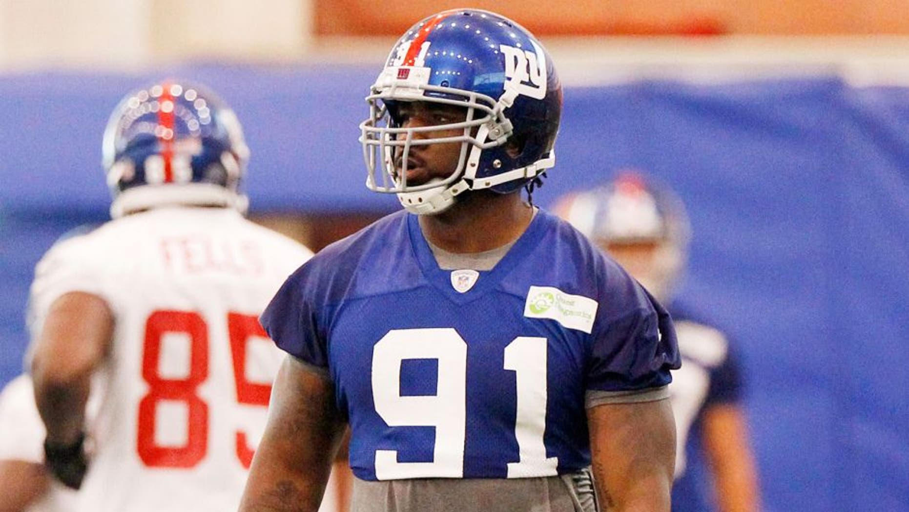 Jun 12, 2014; East Rutherford, NJ, USA; New York Giants defensive end Robert Ayers (91) during New York Giants minicamp at the Quest Diagnostics Training Center. William Perlman/The Star-Ledger-USA TODAY Sports