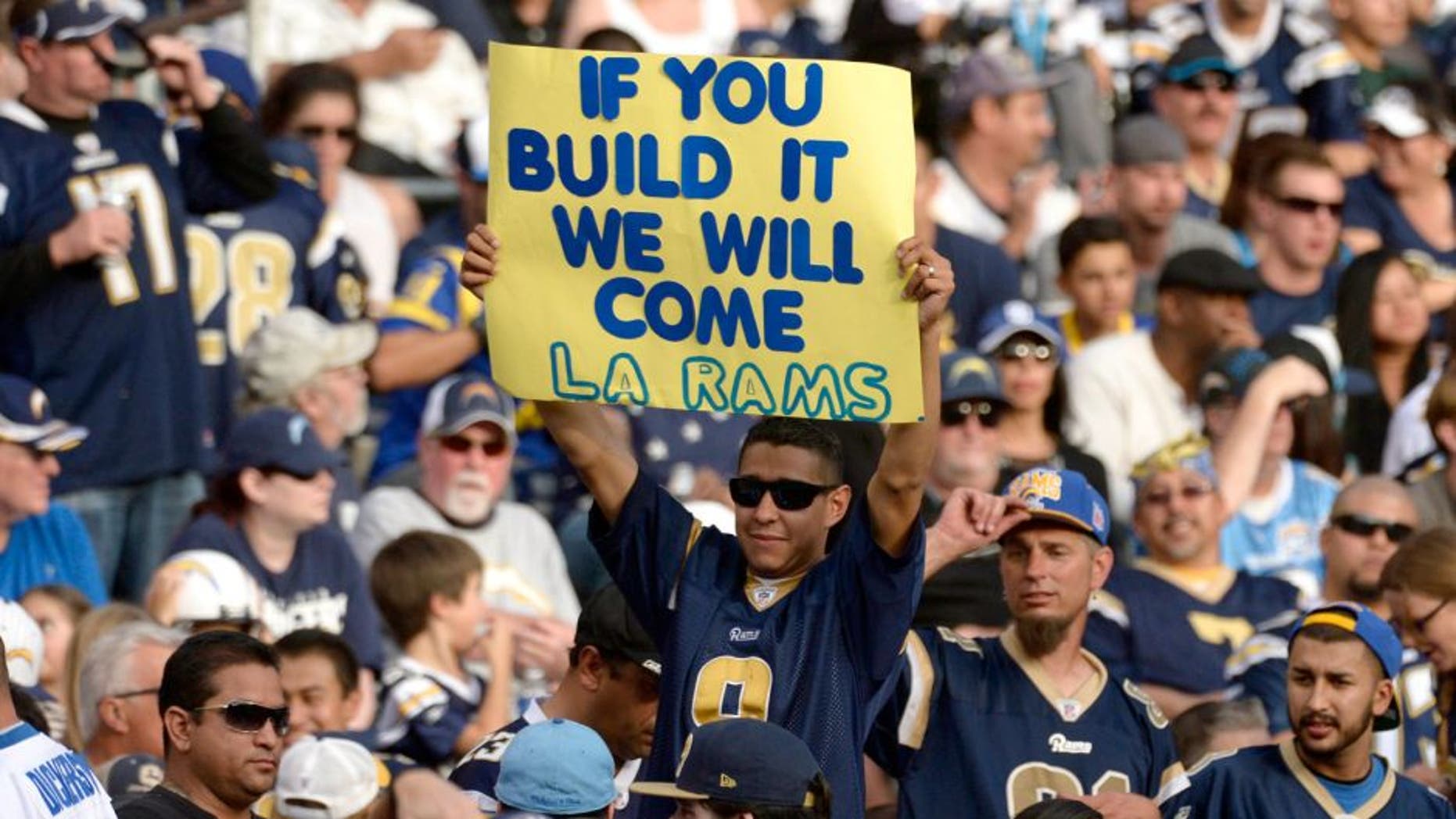 Nov 23, 2014; San Diego, CA, USA; A hopeful Rams fan pleads for a stadium in Los Angeles during the Rams' game against the San Diego Chargers at Qualcomm Stadium. Mandatory Credit: Robert Hanashiro-USA TODAY Sports