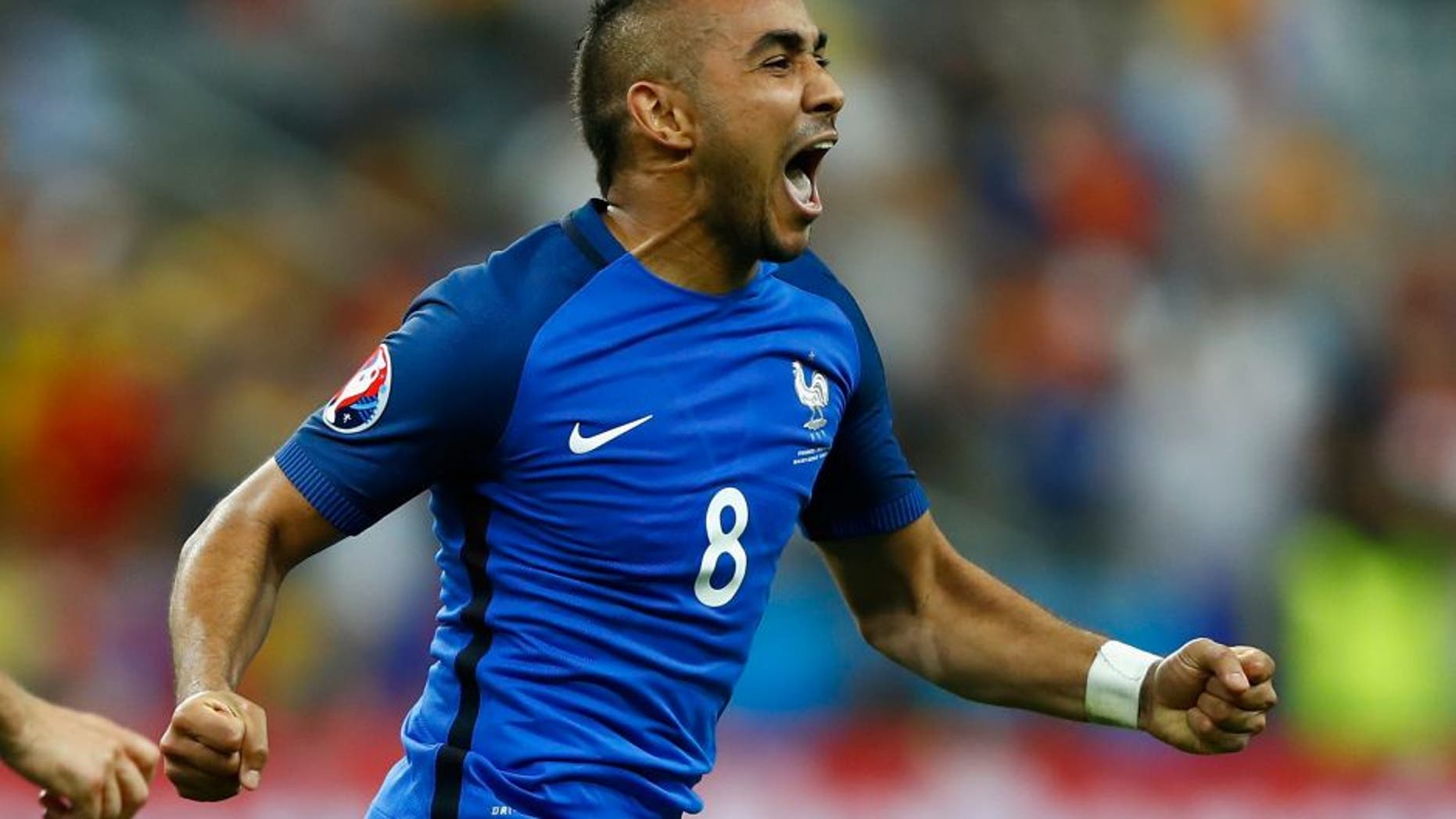 PARIS, FRANCE - JUNE 10: Dimitri Payet of France celebrates scoring his team's second goal during the UEFA Euro 2016 Group A match between France and Romania at Stade de France on June 10, 2016 in Paris, France. (Photo by Clive Rose/Getty Images)