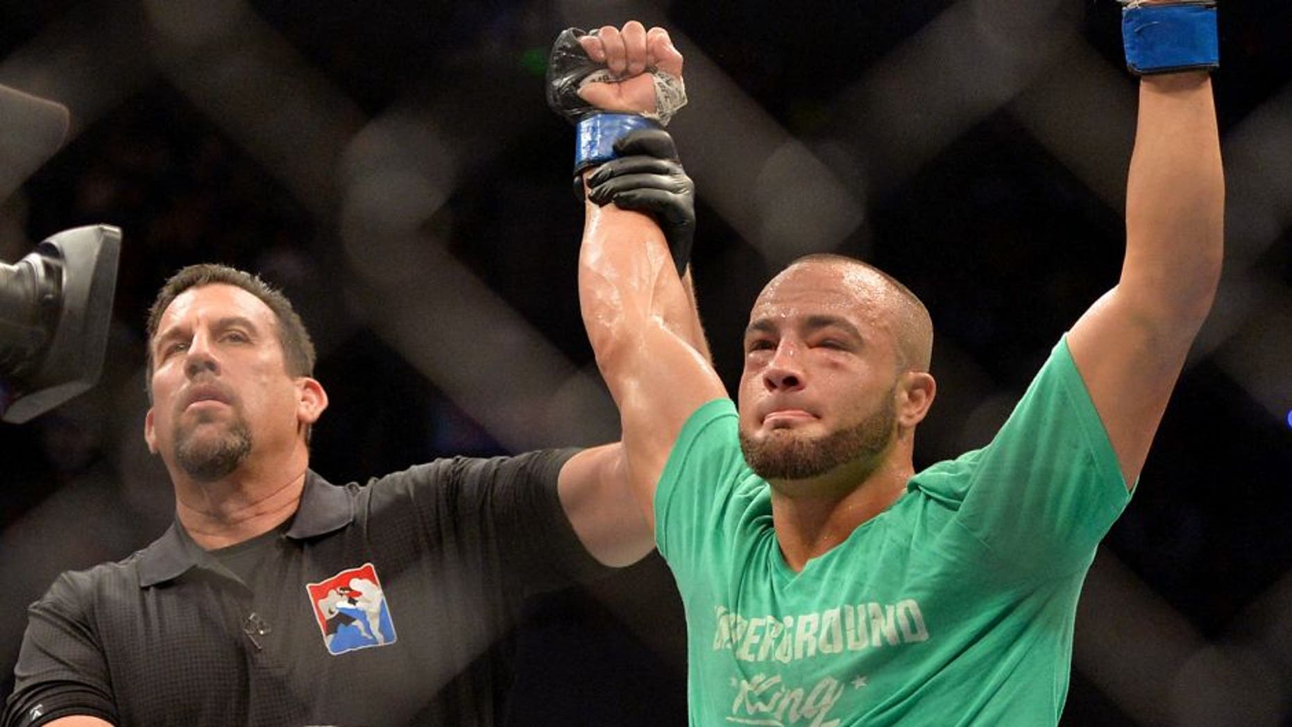MEXICO CITY, MEXICO - JUNE 13: Eddie Alvarez of the United States celebrates his victory over Gilbert Melendez of the United States in their lightweight bout during the UFC 188 event at the Arena Ciudad de Mexico on June 13, 2015 in Mexico City, Mexico. (Photo by Jeff Bottari/Zuffa LLC/Zuffa LLC via Getty Images)