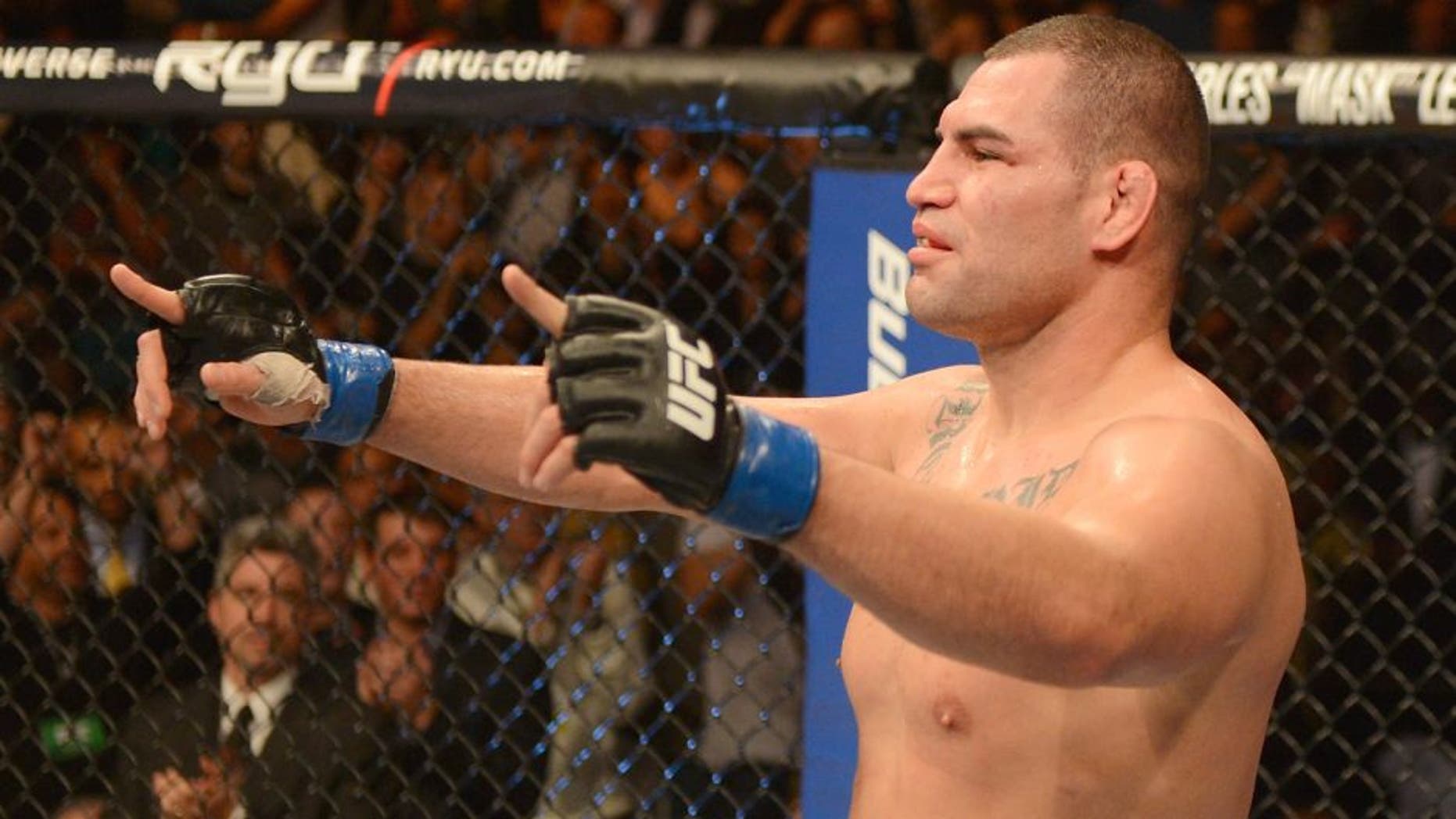 Cain Velasquez reacts after his dominating performance against Junior dos Santos during their heavyweight championship fight at UFC 155 on December 29, 2012 at MGM Grand Garden Arena in Las Vegas, Nevada. (Photo by Donald Miralle/Zuffa LLC/Zuffa LLC via Getty Images)