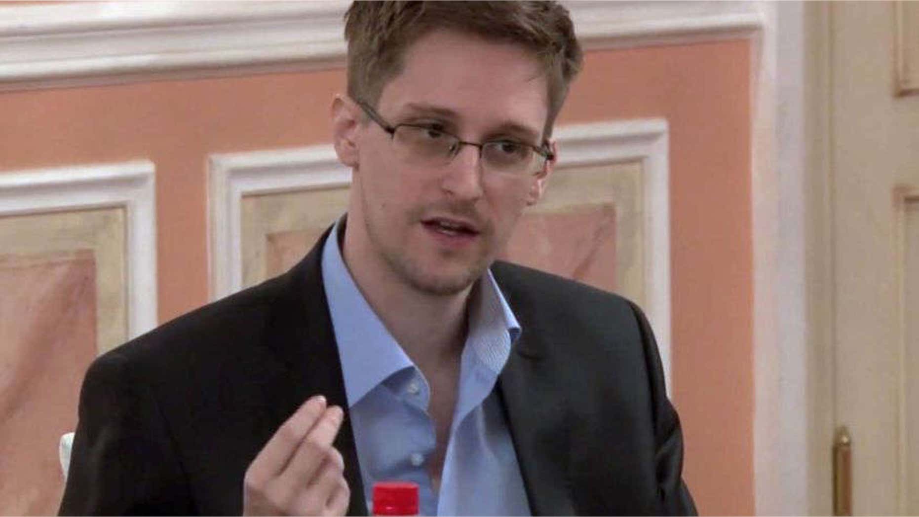 Oct. 11, 2013: Former National Security Agency systems analyst Edward Snowden speaks during a presentation ceremony for the Sam Adams Award in Moscow, Russia.