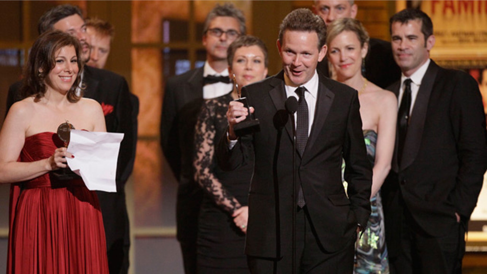 June 13: Author John Logan accepts the Tony Award for Best Play for "Red" during the 61st Tony Awards in New York.