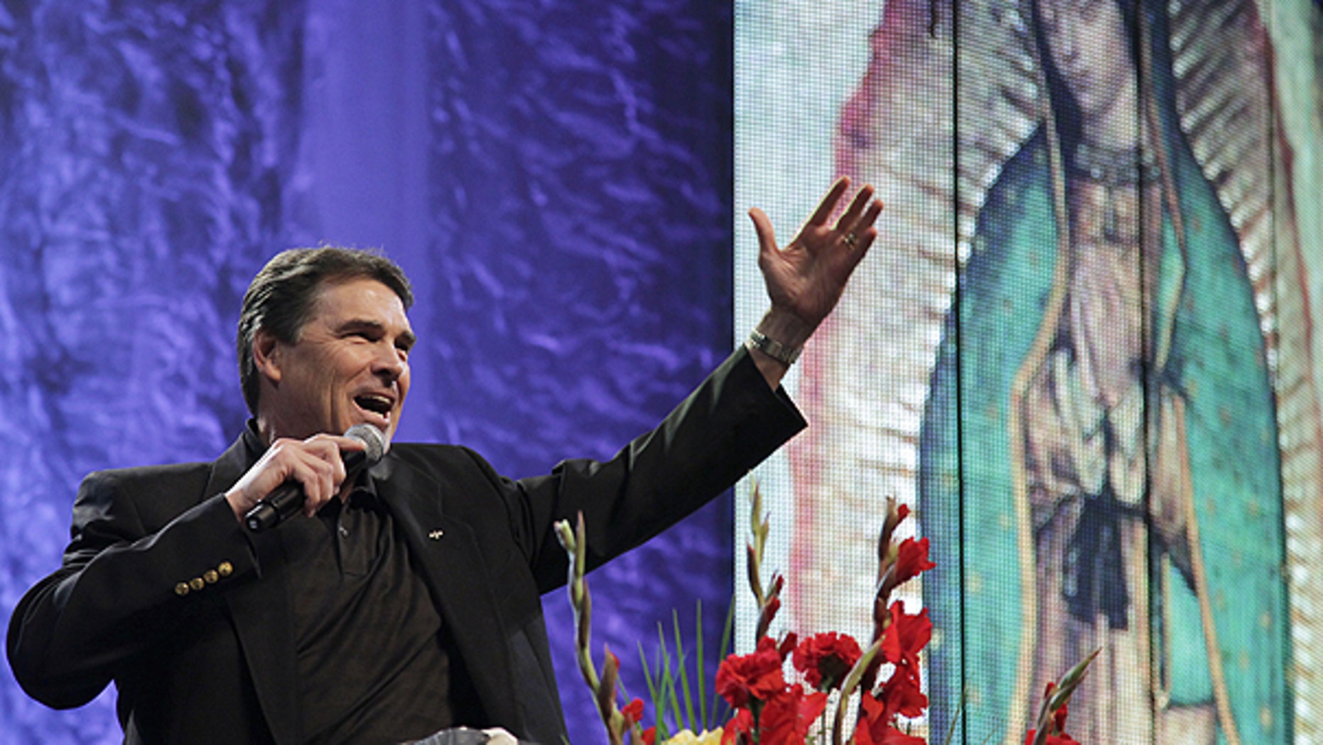 June 12: Texas Gov. Rick Perry speaks during a United For Life event event organized by a Hispanic anti-abortion group at the Los Angeles Memorial Sports Arena in Los Angeles.