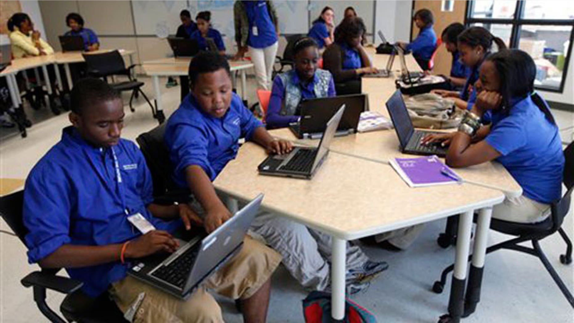 May 20: students use laptop computers in the classroom at the 'School of the Future' in Philadelphia.