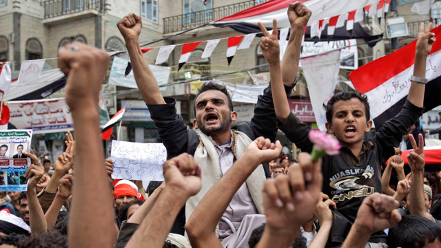 June 15: Anti-government protestors chant slogans during a demonstration demanding the resignation of Yemeni President Ali Abdullah Saleh, in Sanaa, Yemen.
