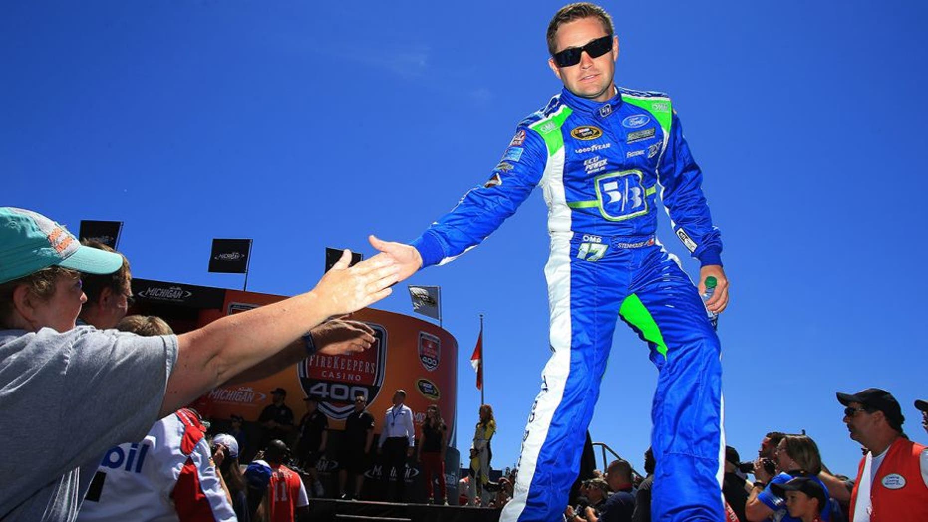 BROOKLYN, MI - JUNE 12: Ricky Stenhouse Jr, driver of the #17 Fifth Third Bank Ford, participates in pre-race ceremonies prior to the NASCAR Sprint Cup Series FireKeepers Casino 400 at Michigan International Speedway on June 12, 2016 in Brooklyn, Michigan. (Photo by Daniel Shirey/NASCAR via Getty Images)